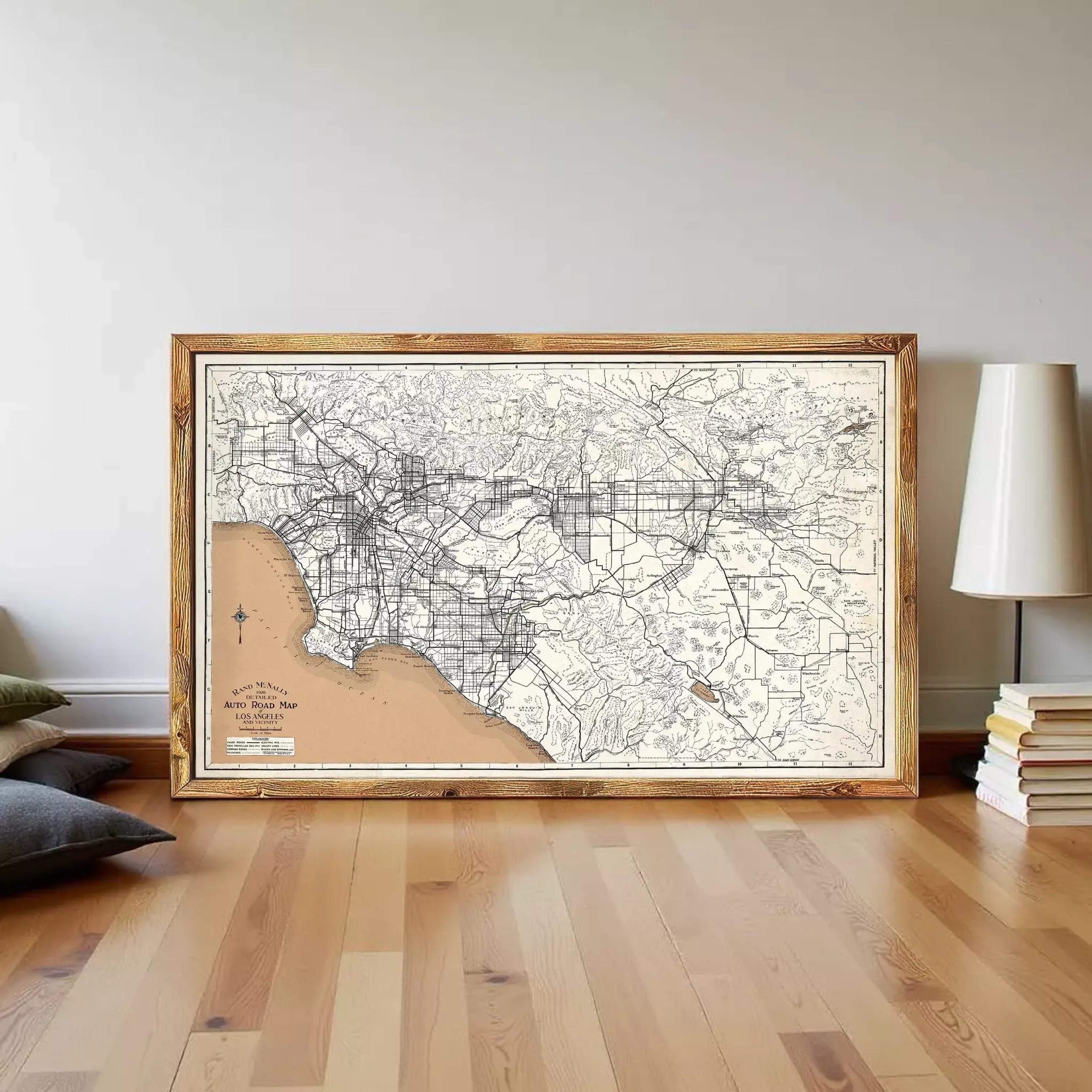 The image is a framed map of Los Angeles, California, with a wooden frame.