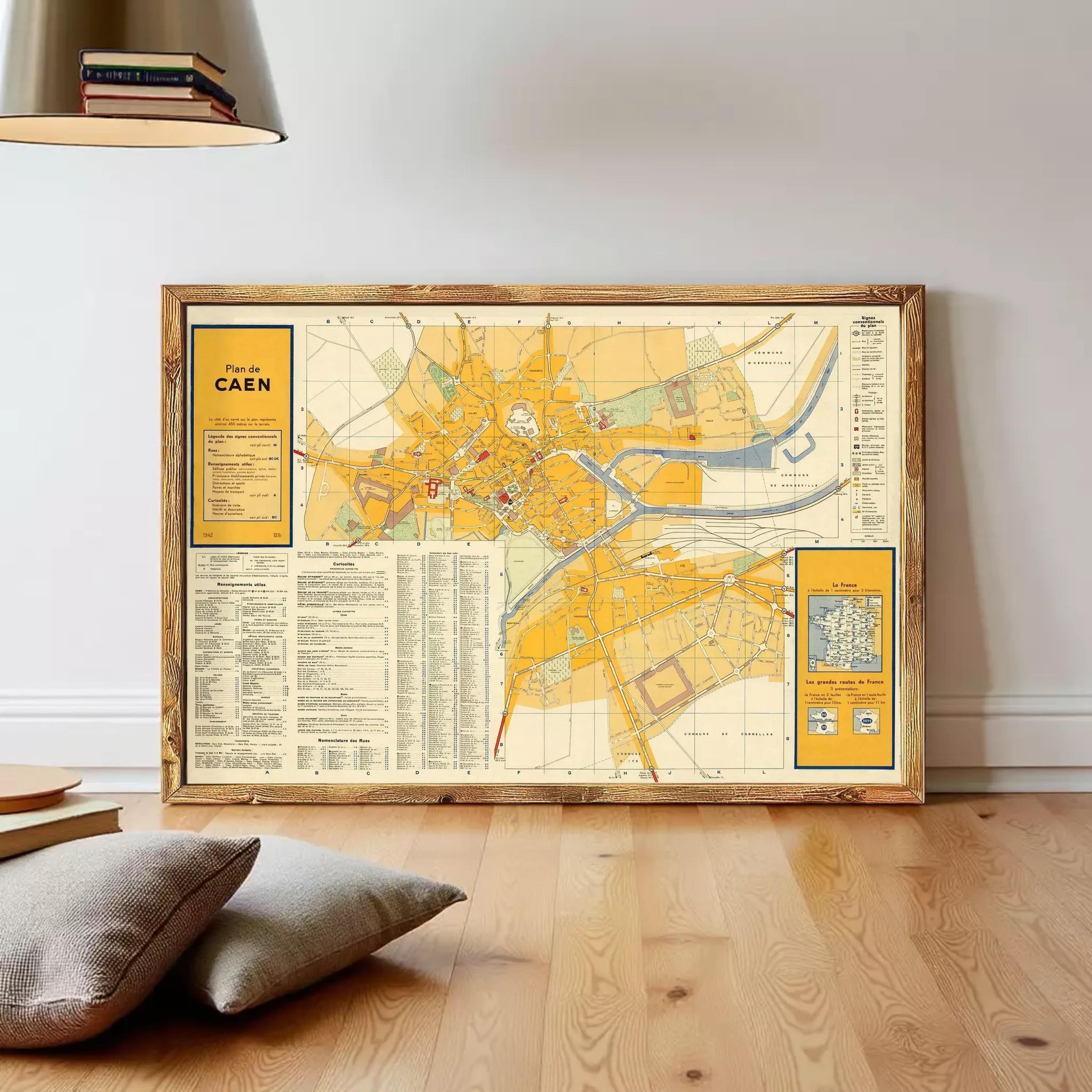 The image is a framed map of a city, likely Caen, with various streets, landmarks, and other geographical features depicted.