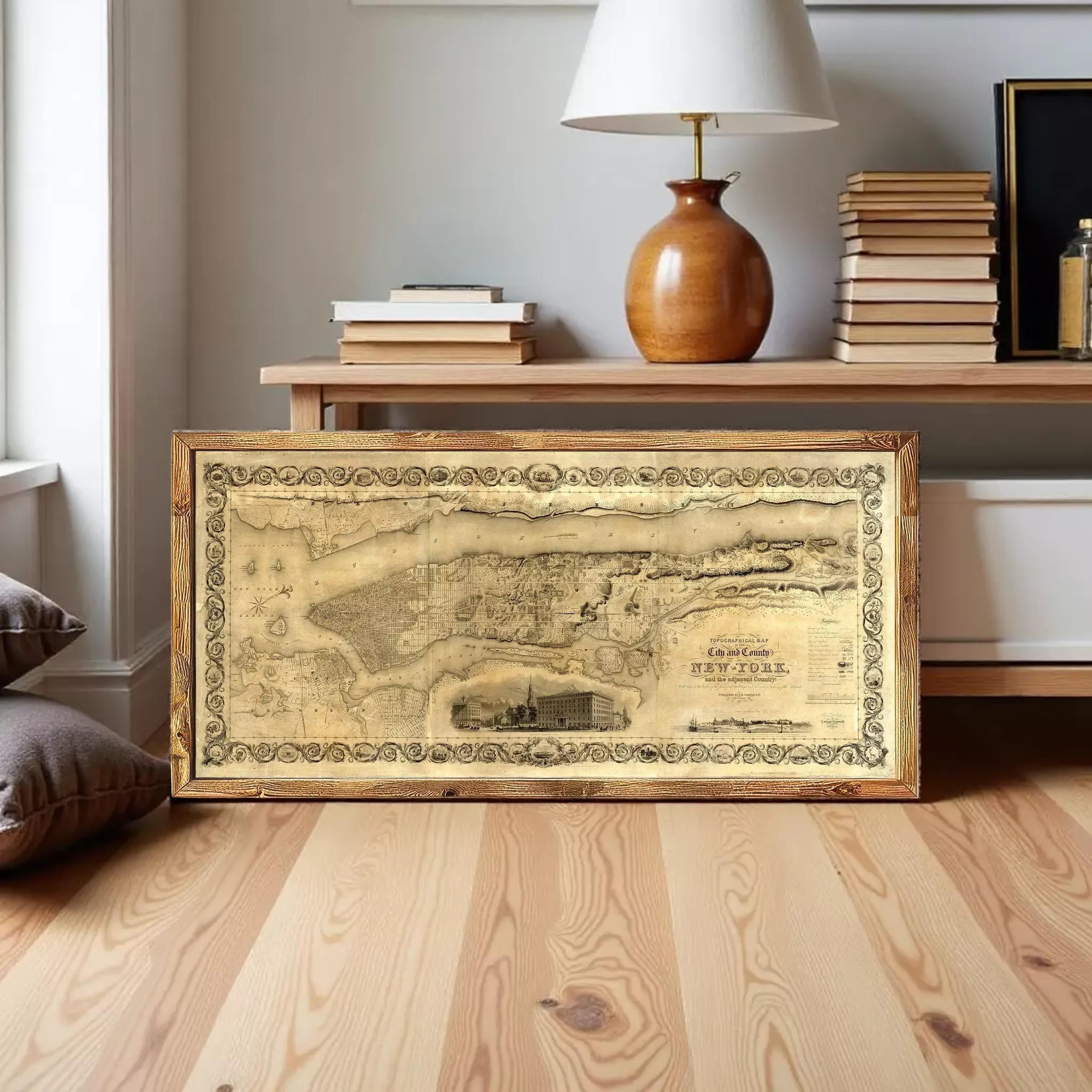 The image is a framed antique map of New York, depicting a detailed layout of the city.