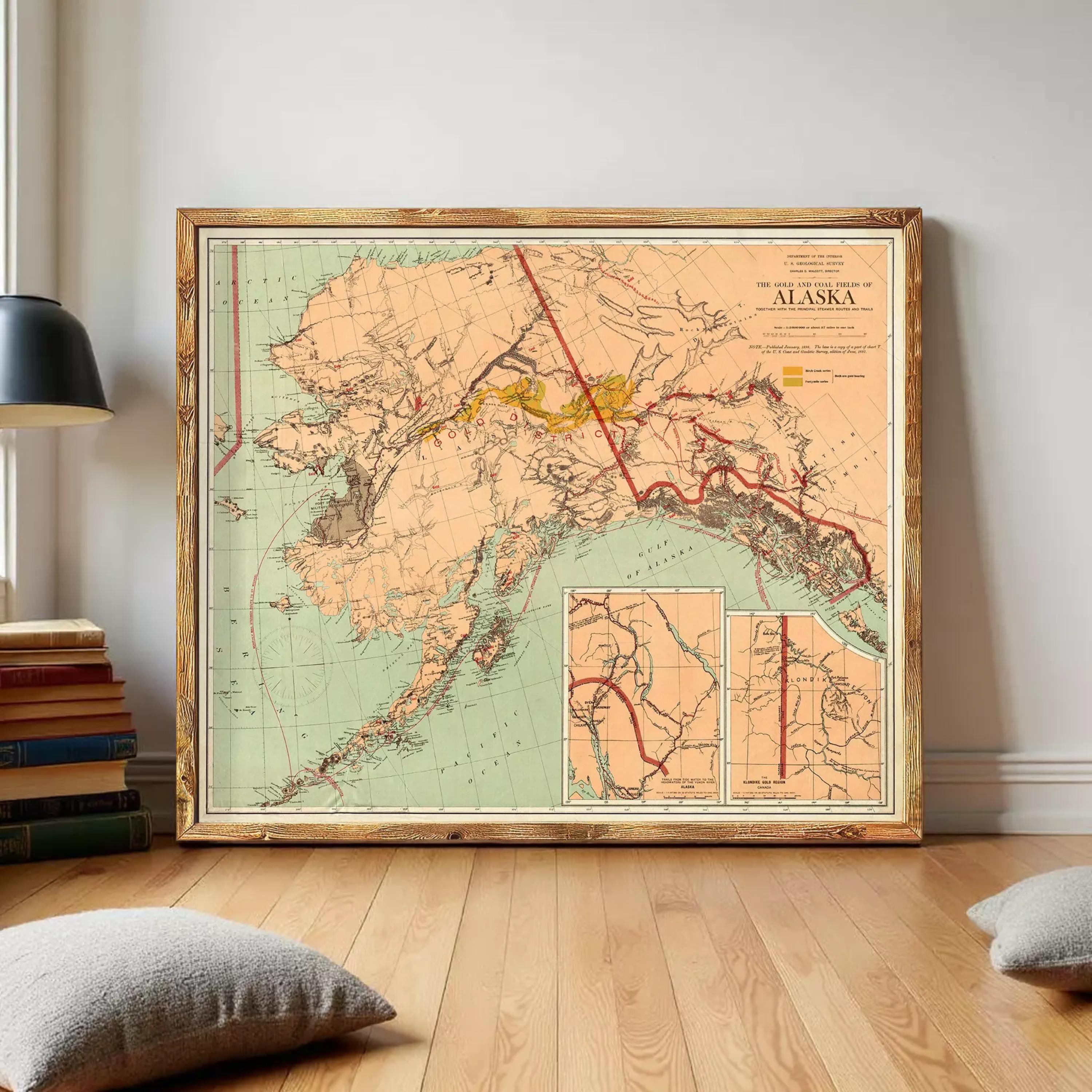 a large framed map of Alaska, with a wooden frame and a vintage style.