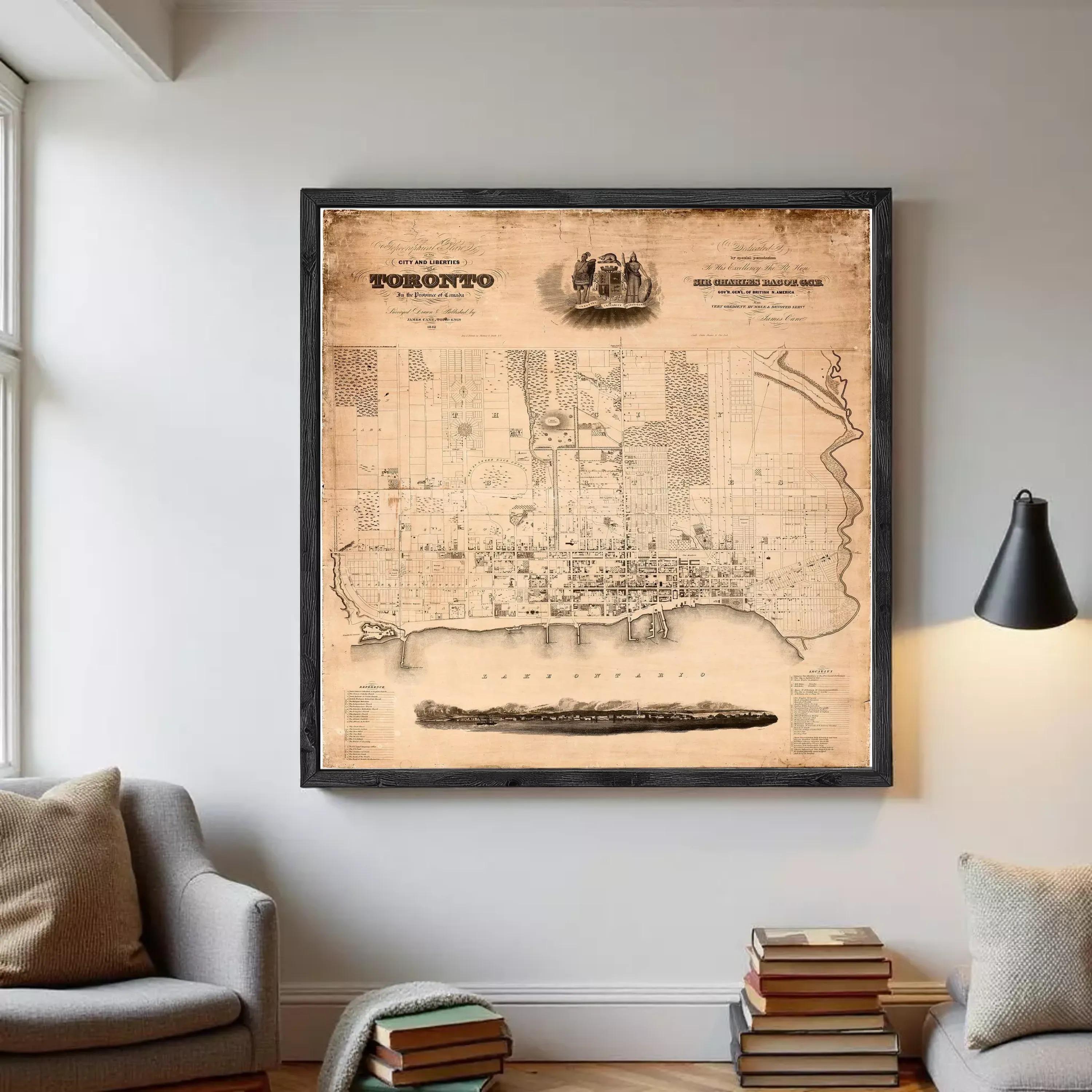 The image is a framed vintage map of Toronto, Canada, depicting the city's layout and surrounding areas.