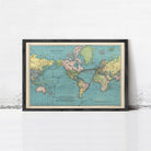 The image is a framed vintage map of the world, depicting the continents and oceans in a colorful and detailed manner.