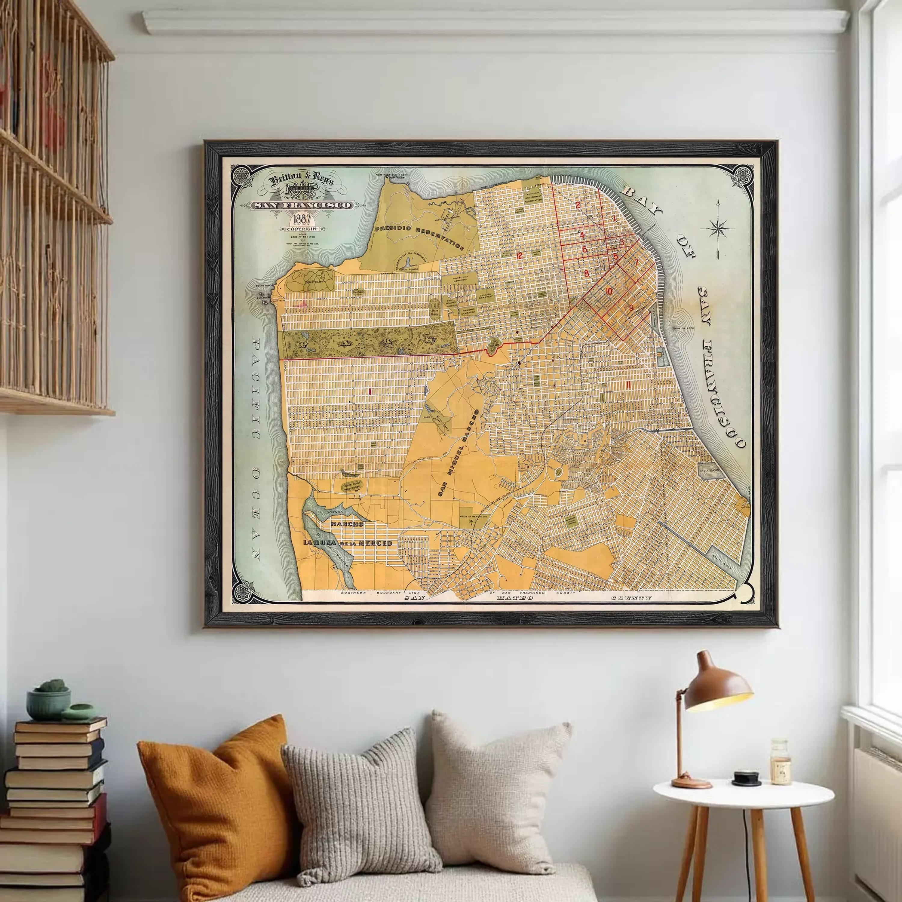The image is a framed vintage map of San Francisco, California, depicting the city's streets, landmarks, and surrounding areas.