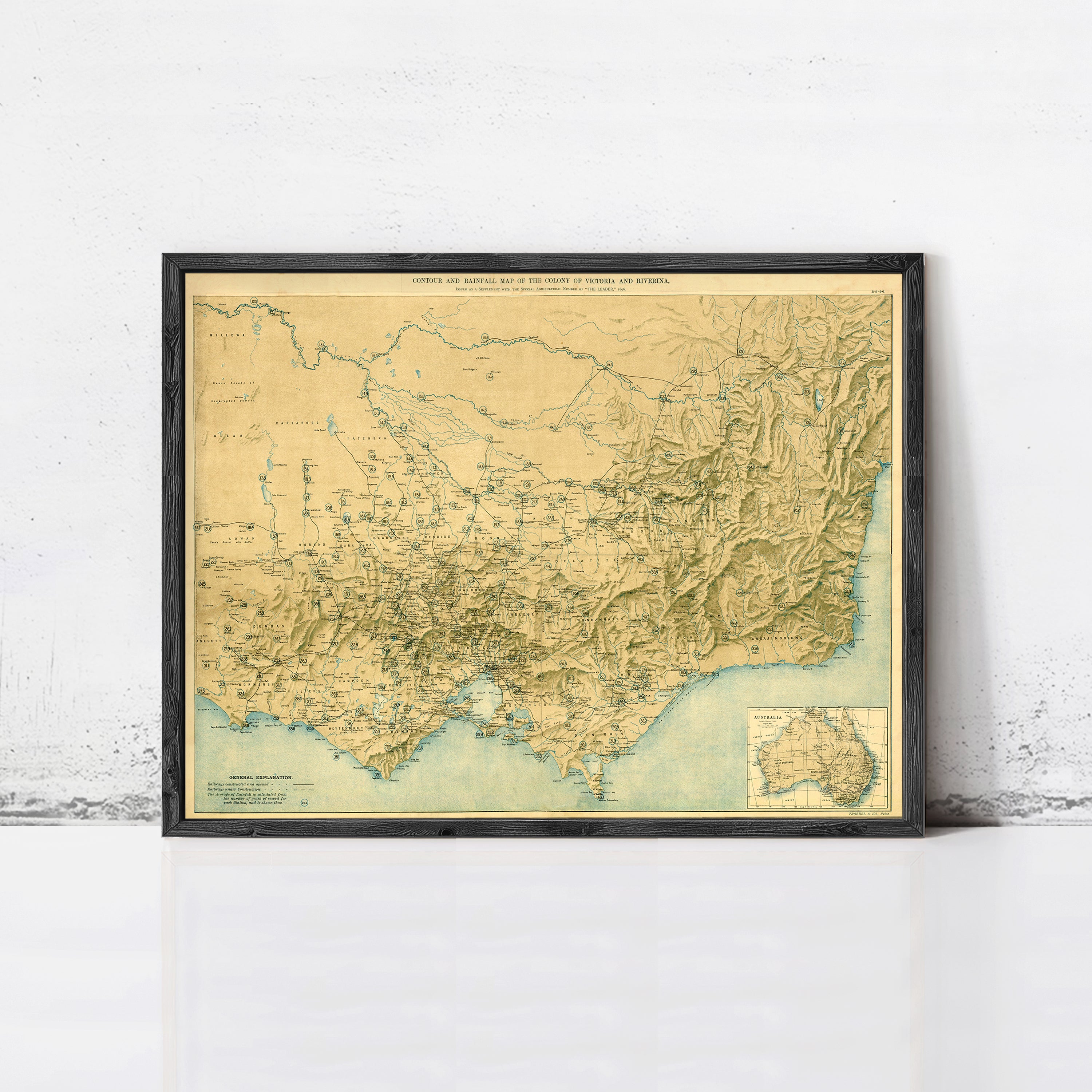 The image is a framed vintage map of Victoria and New South Wales, Australia, depicting the region's geographical layout and features.