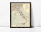 The image is a framed vintage map of Italy, showing the country's geographical layout and surrounding areas.