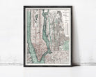 The image is a framed vintage map of New York City, depicting the city's streets, waterways, and surrounding areas.