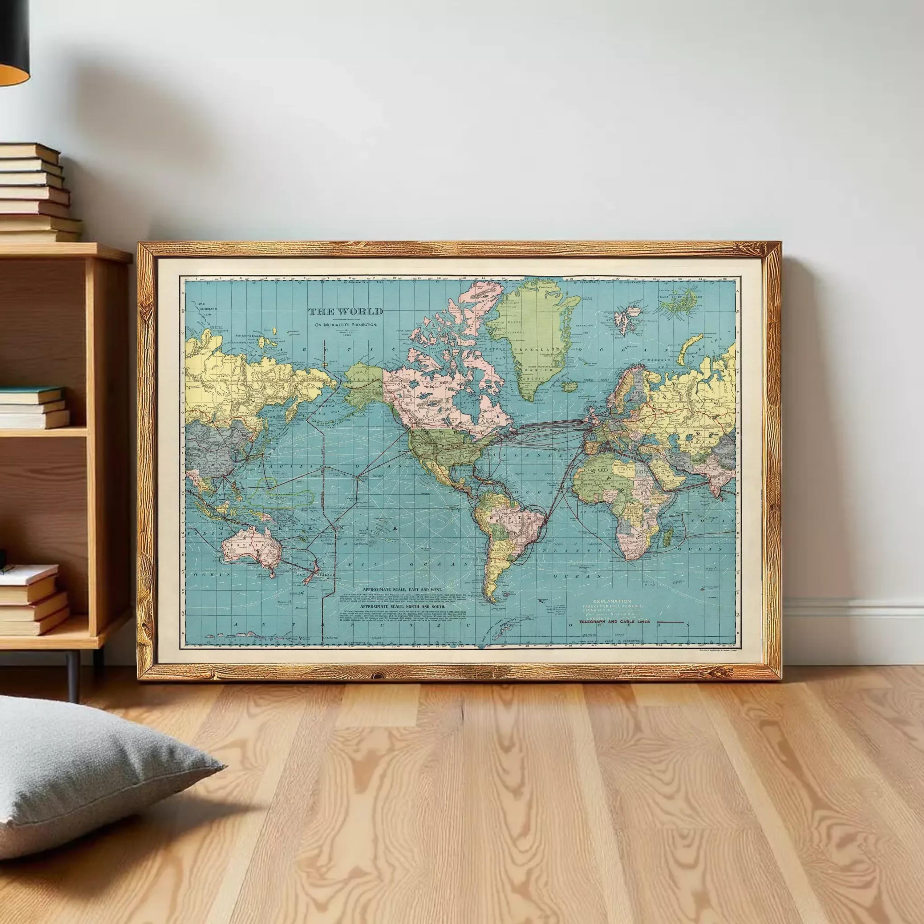 The image is a framed vintage map of the world, depicting the continents and oceans in a colorful and detailed manner.