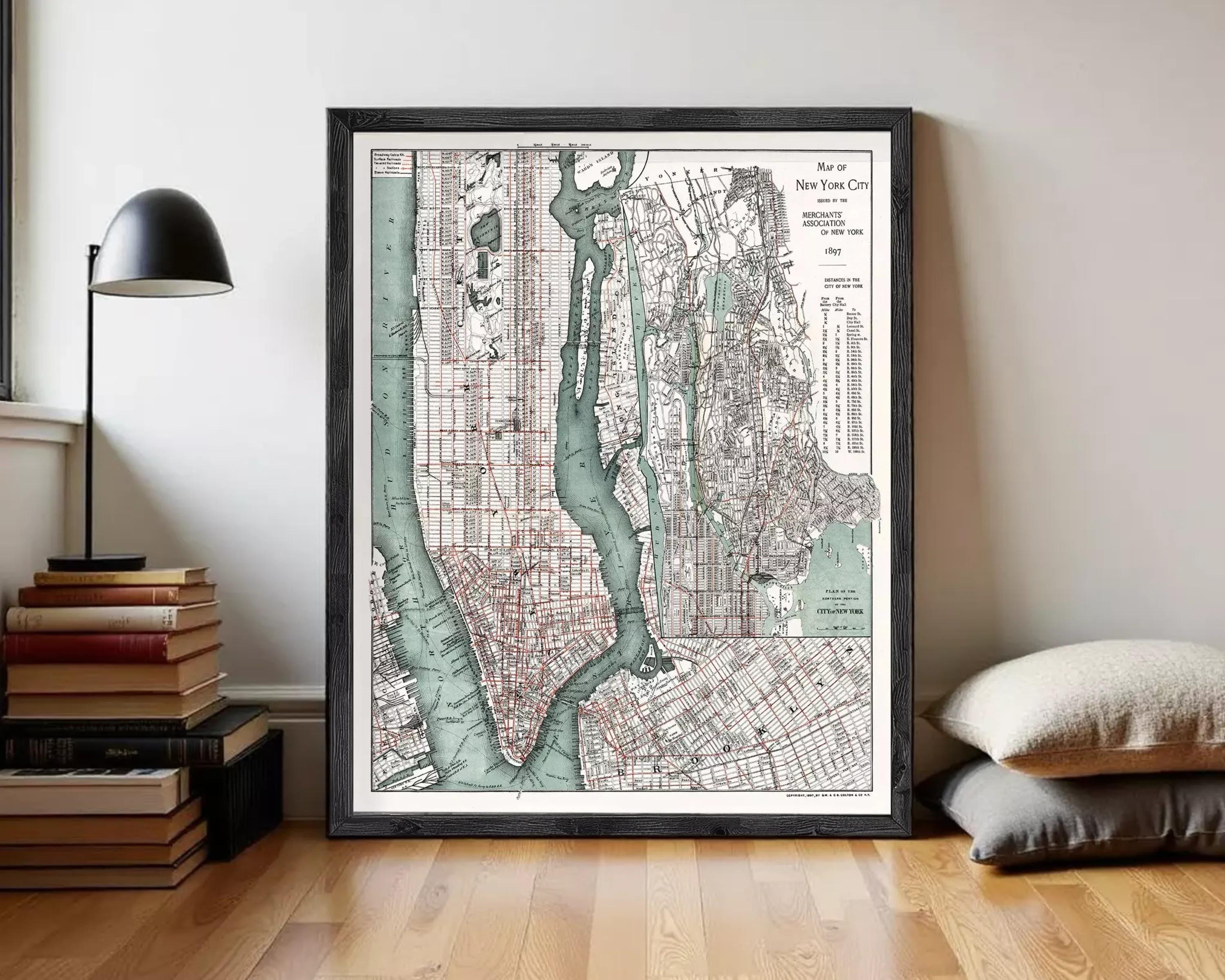 The image is a framed vintage map of New York City, depicting the city's streets, waterways, and surrounding areas.