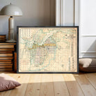 The image is a framed vintage map of a city, likely Ottawa, Canada, with detailed street and area labels.