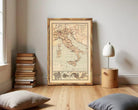 The image is a framed vintage map of Italy, showing the country's geographical layout and surrounding areas.
