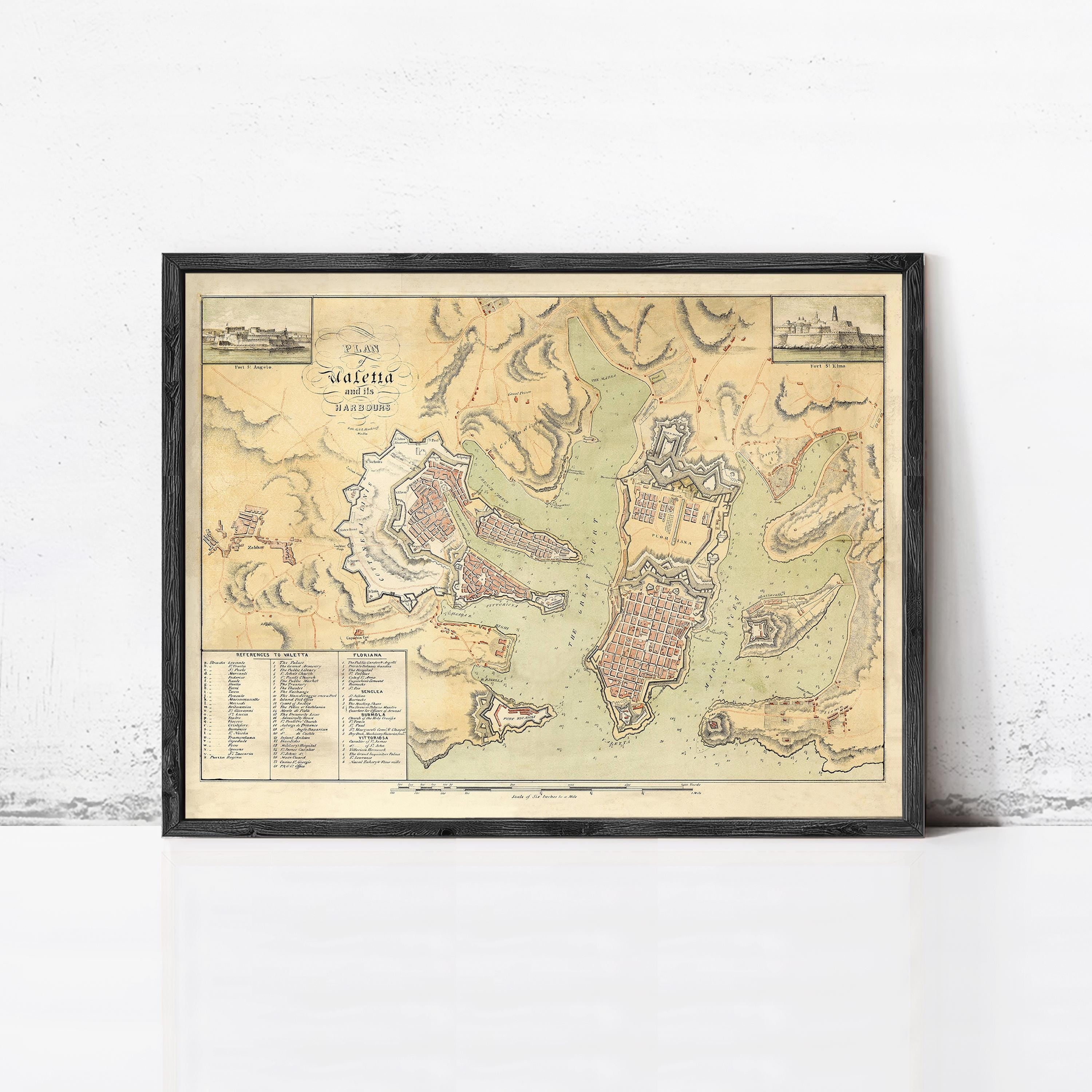 The image is a framed historical map of a region, likely depicting a city or town.