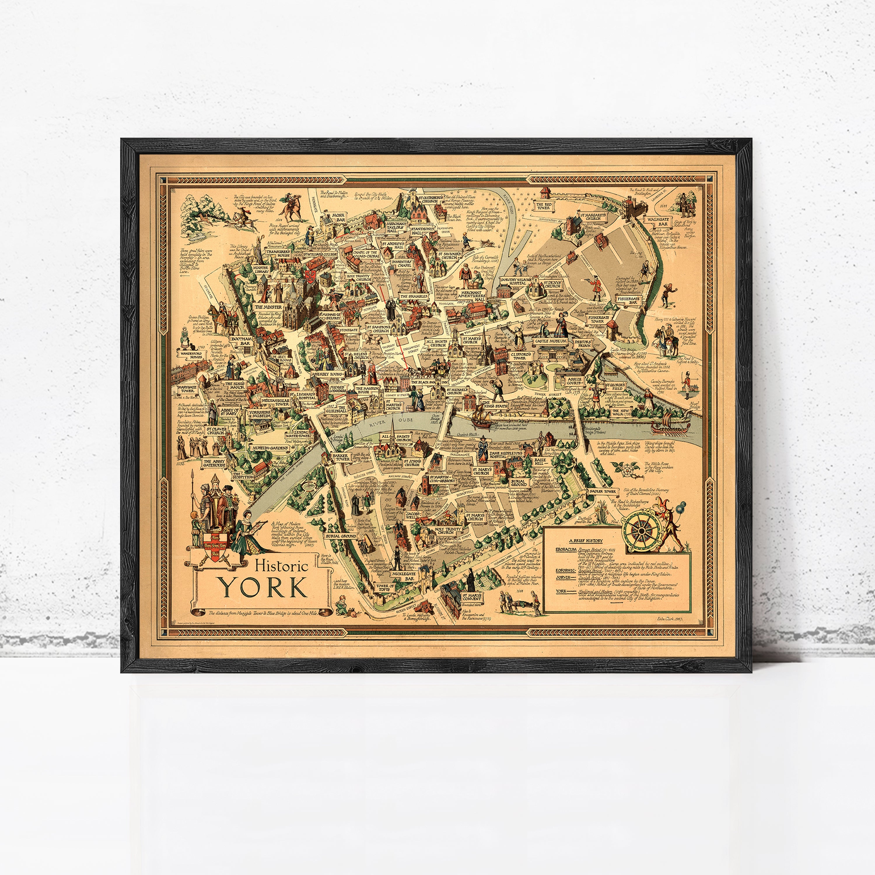 The image is a framed vintage map of historic York, England, depicting various landmarks and locations within the city.