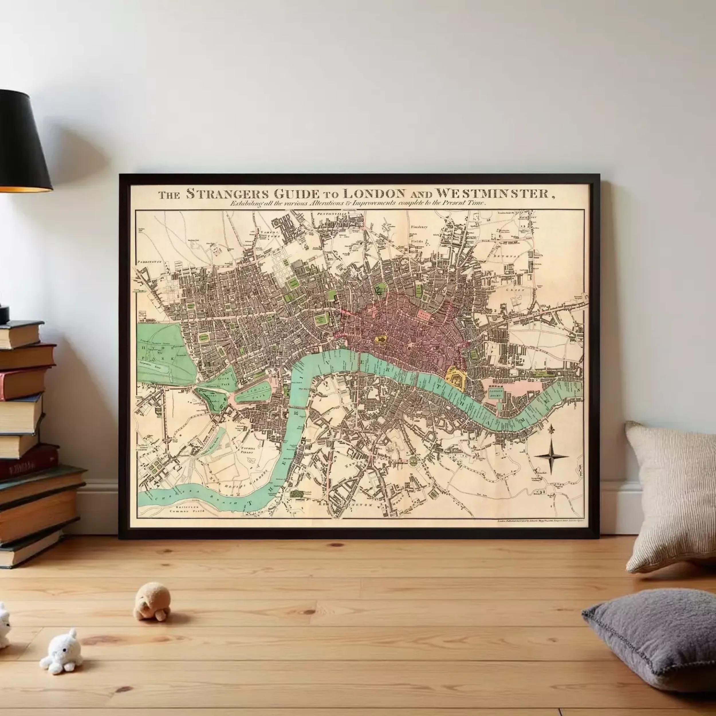 a large framed map of London and Westminster, with a vintage style and a green and brown color scheme.