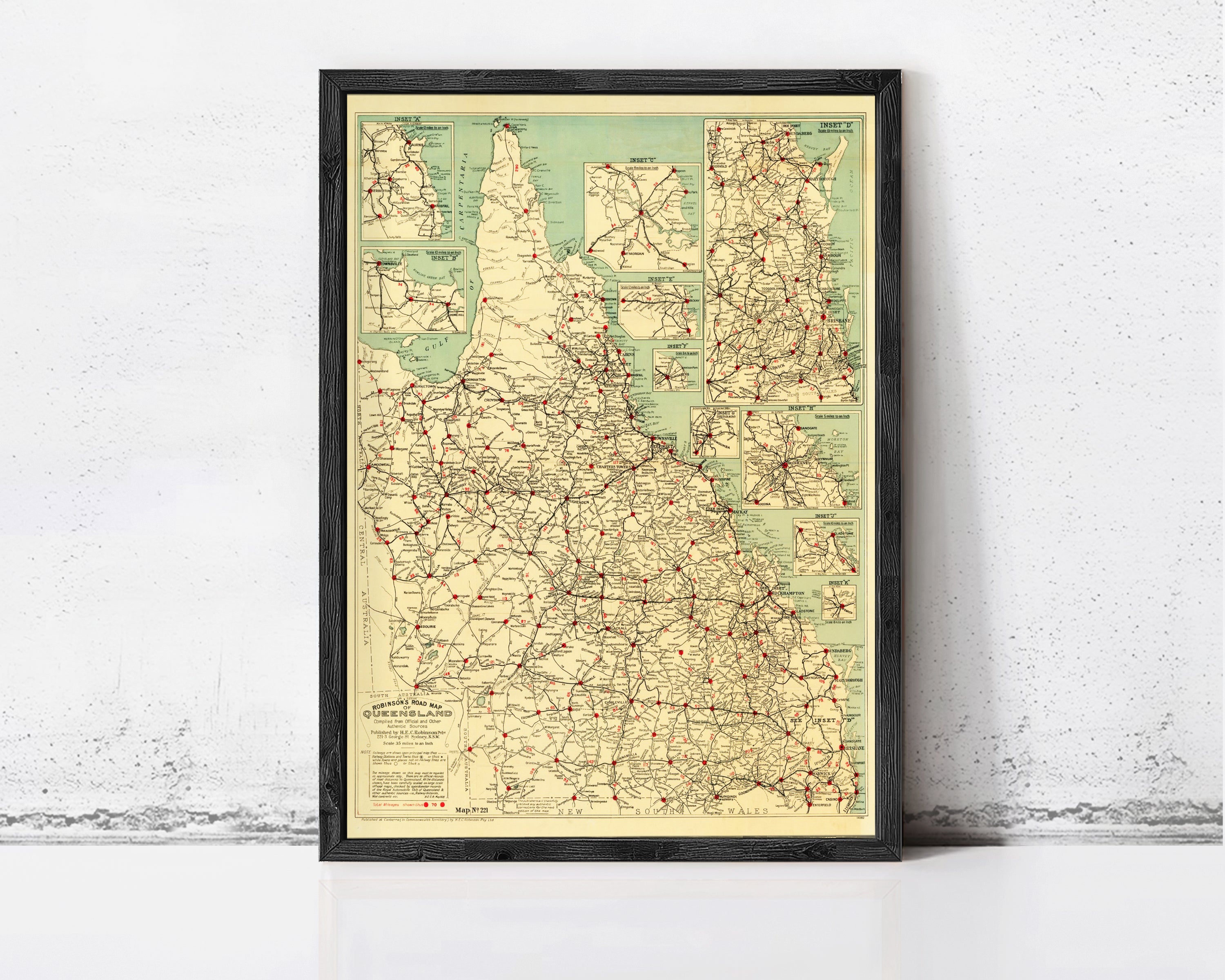 The image is a framed vintage map of the Northern Territory of Australia, showing the extensive road network and surrounding areas.