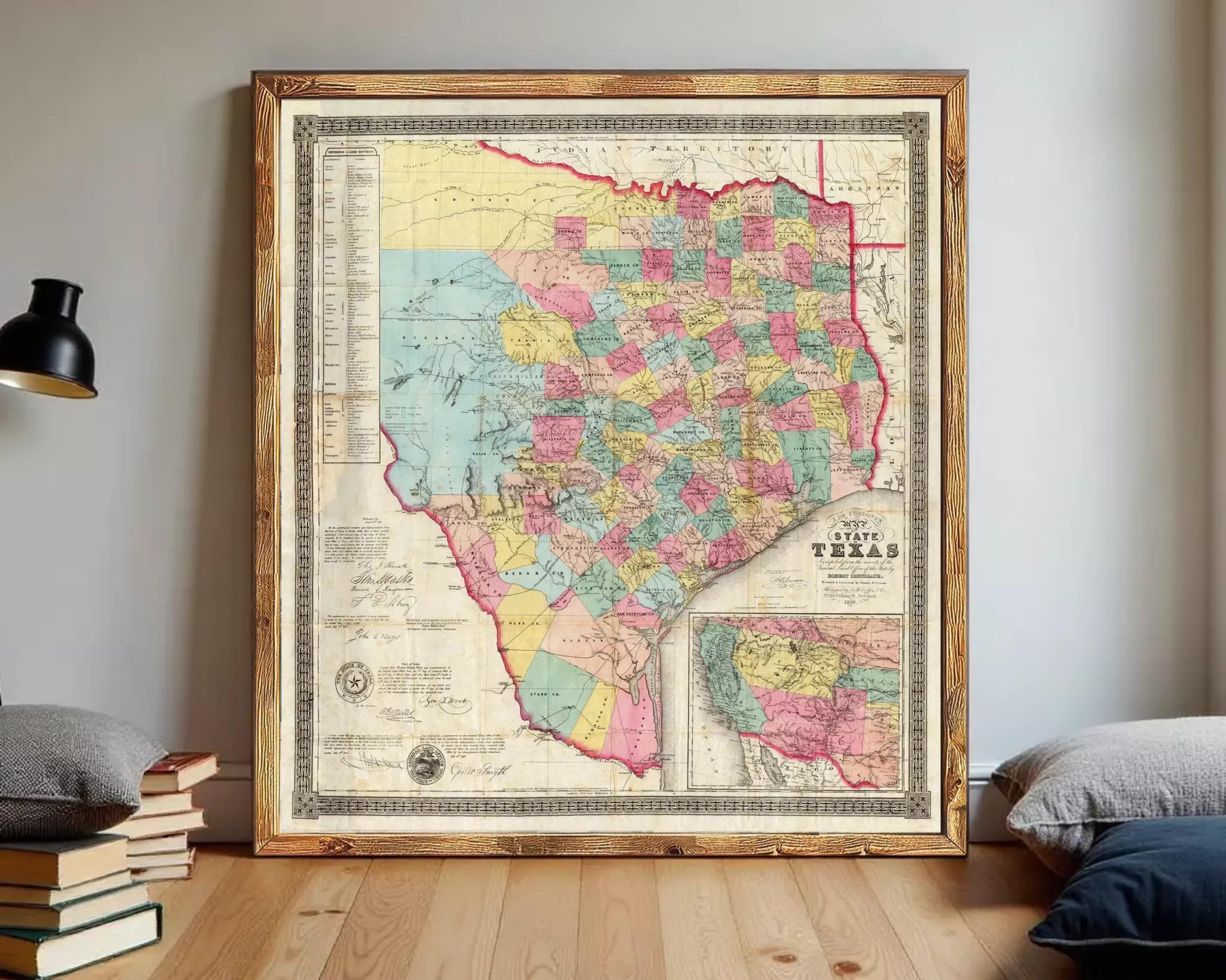 The image is a framed vintage map of Texas, depicting the state in a detailed and colorful manner.
