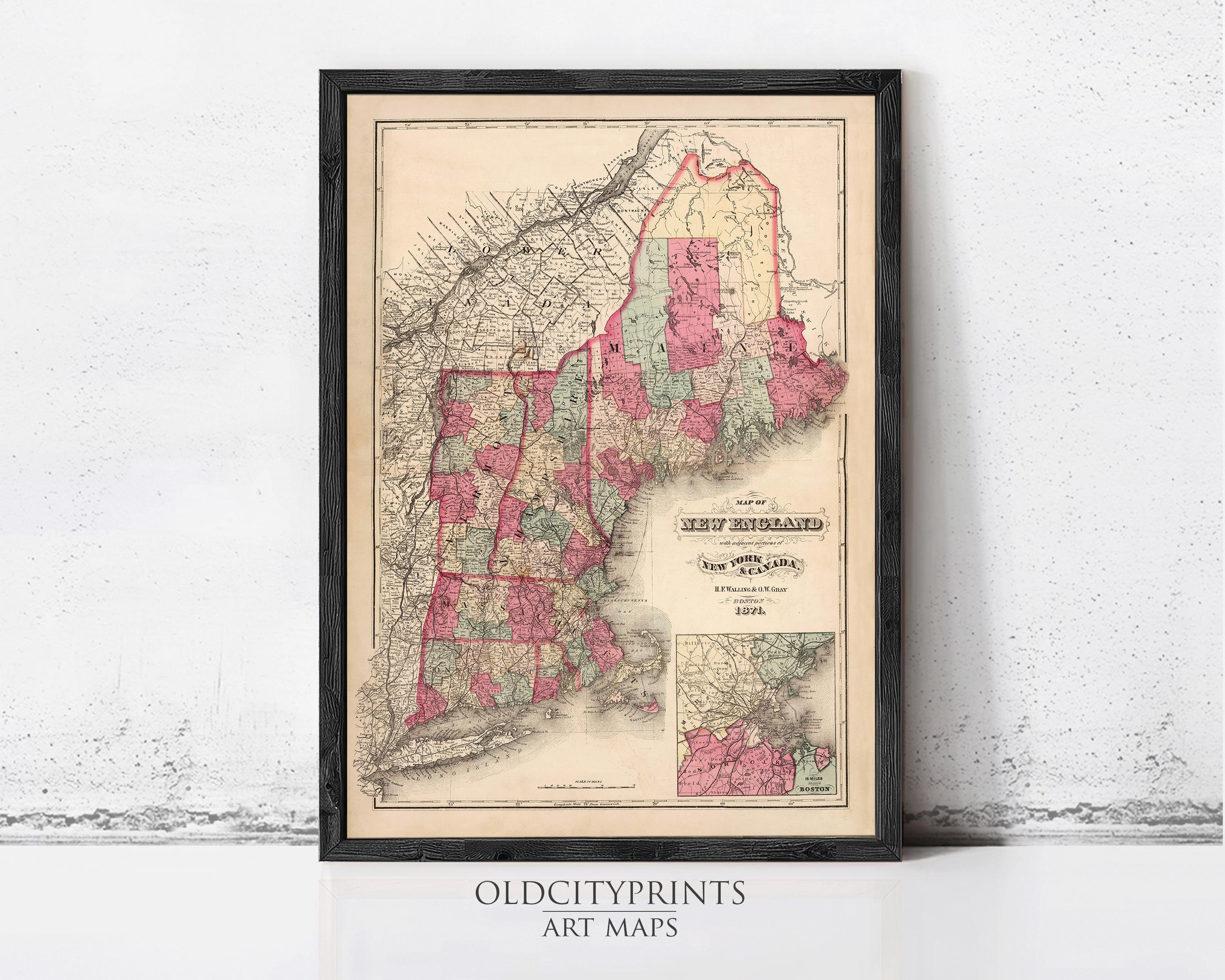 The image is a framed vintage map of New England, depicting the region in a detailed and colorful manner.