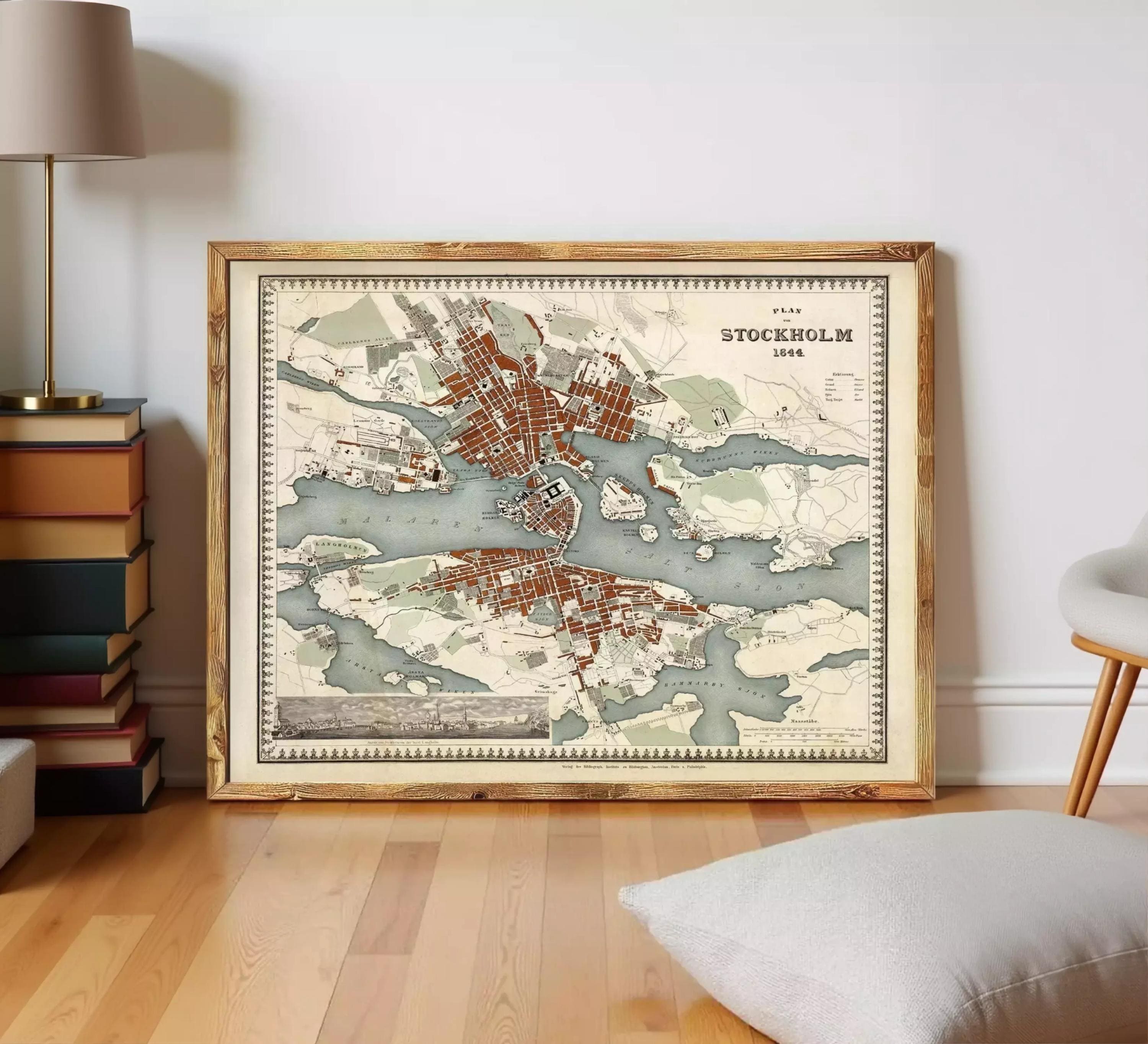 a framed map of Stockholm, Sweden, with a wooden frame and a vintage-style design.