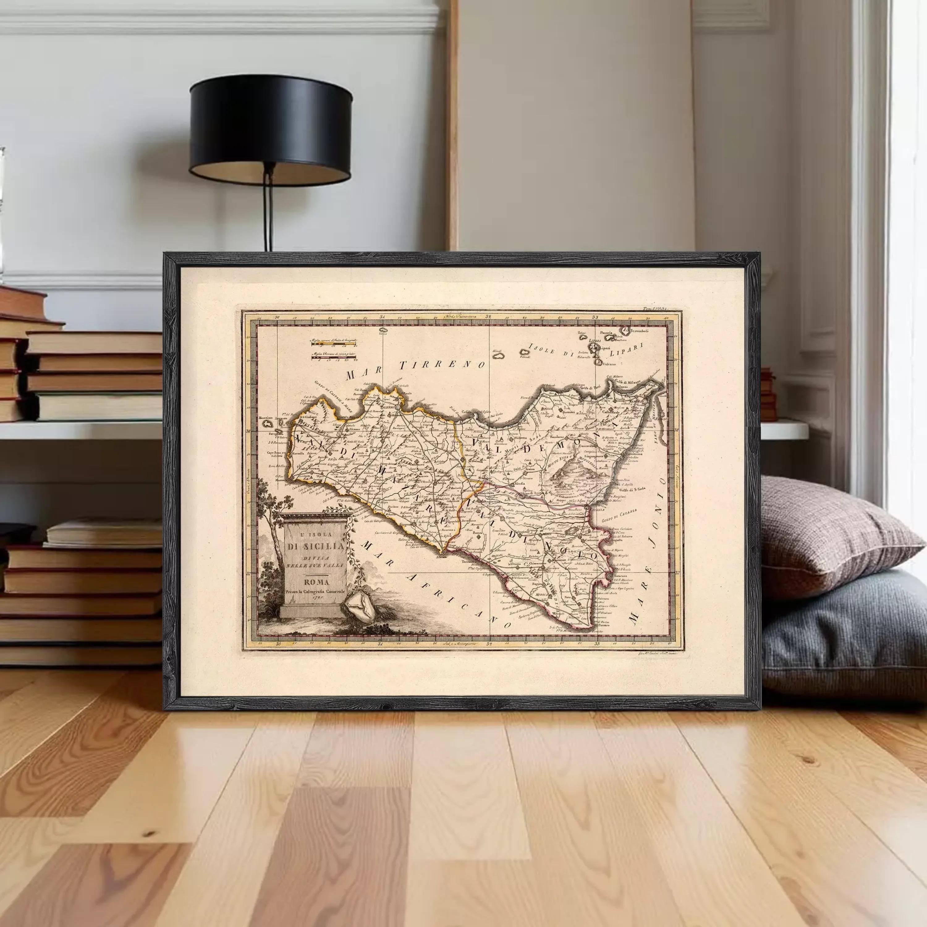 The image is a framed antique map of Italy, depicting the country's geographical layout and boundaries.