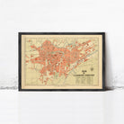 The image is a framed vintage map of the city of Clermont-Ferrand, France, depicting the layout and geographical features of the area.