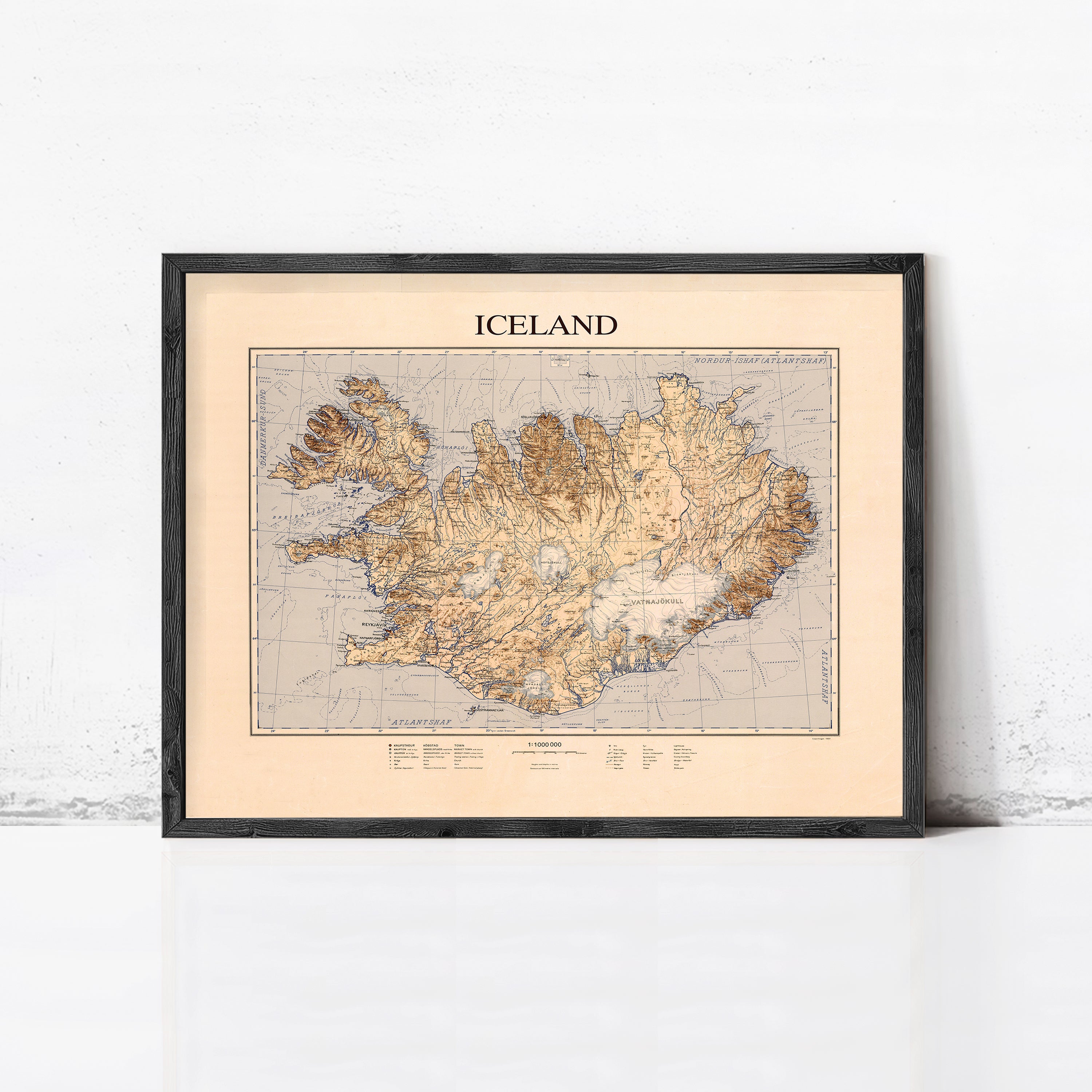 The image is a framed map of Iceland, depicting the country's geographical features and boundaries.