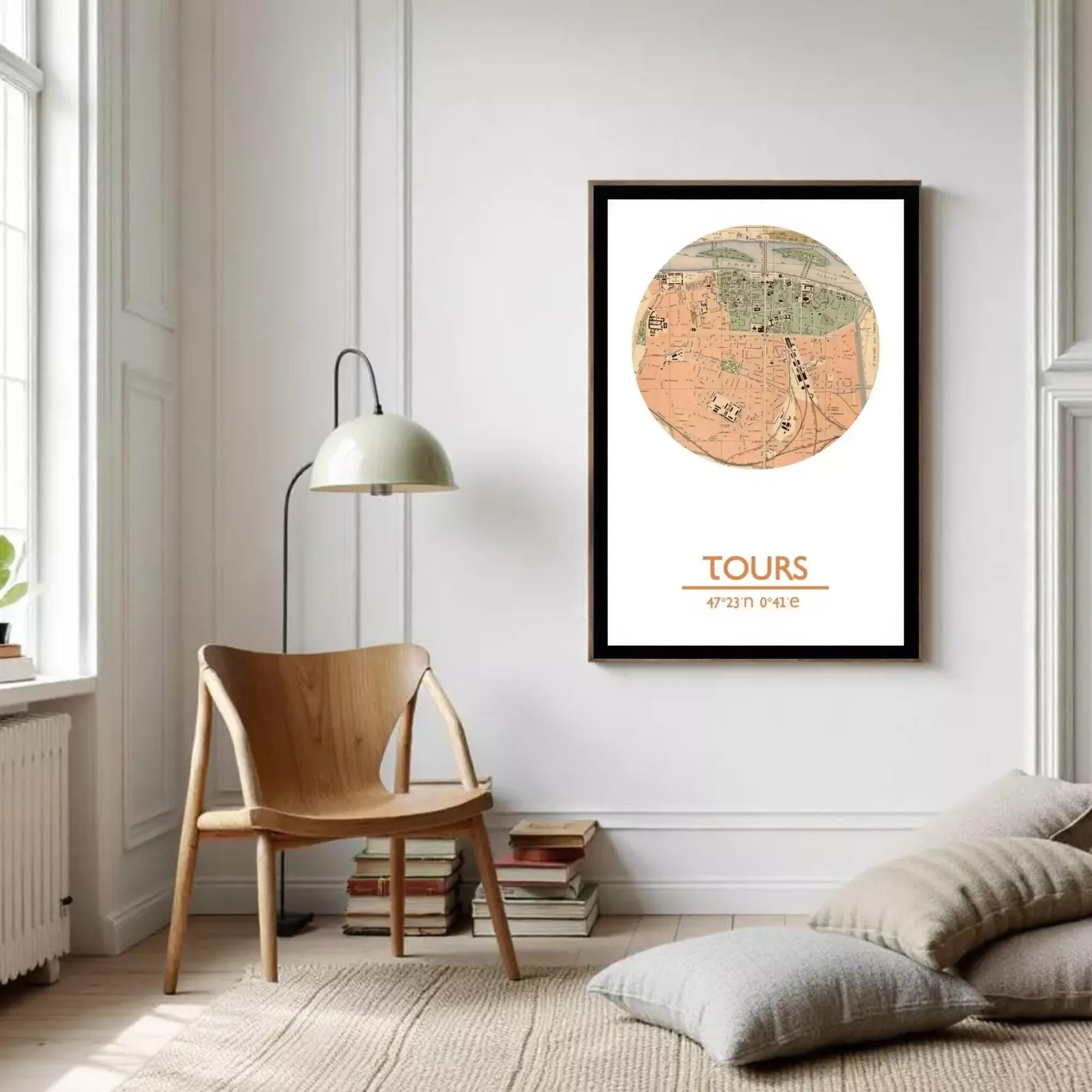 A framed vintage map of a city, with the word "TOURS" printed below it.
