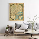 a large framed map of the United States hanging on a wall in a living room setting.