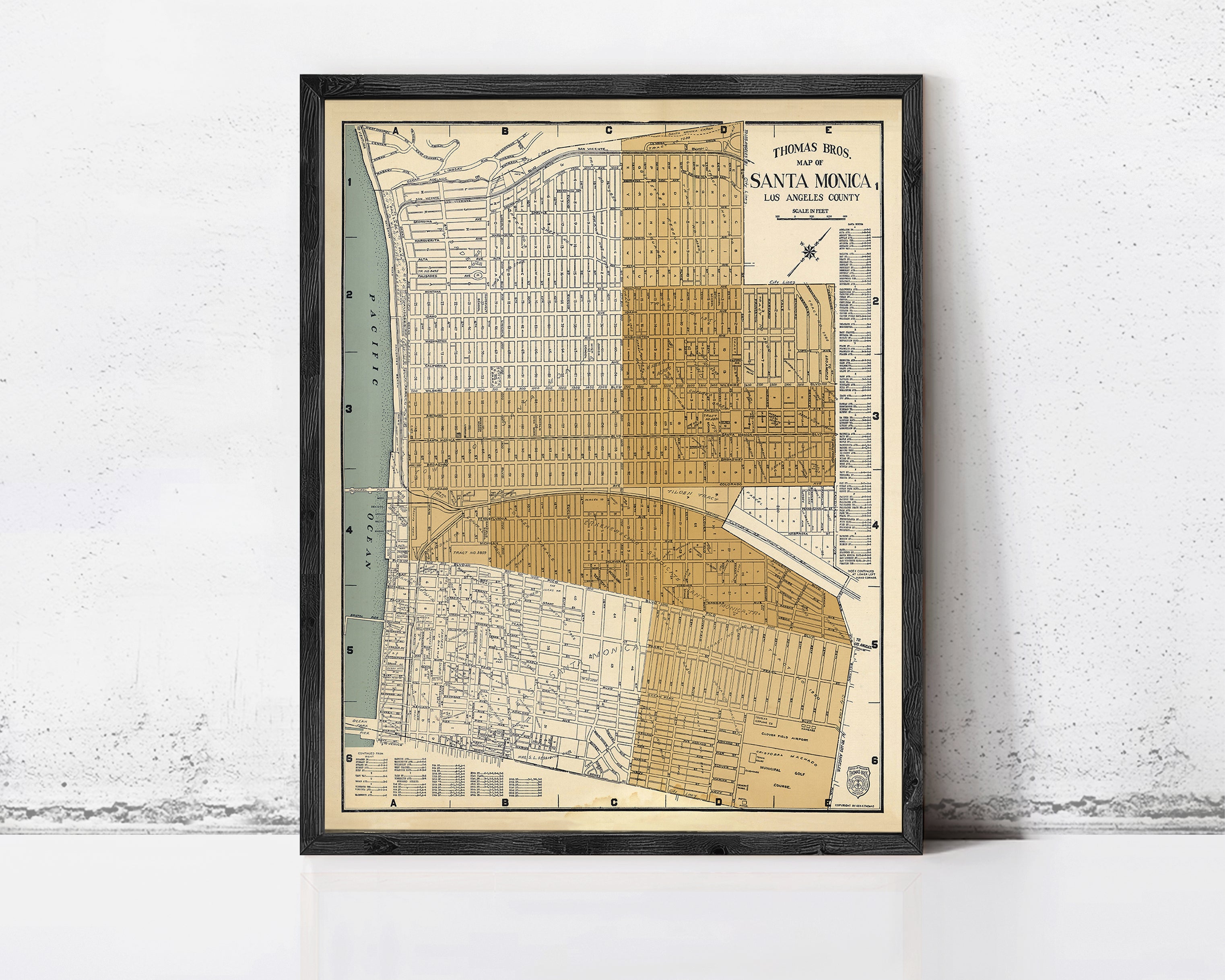 A framed map of Santa Monica, Los Angeles County, California, depicting the city's layout and surrounding areas.