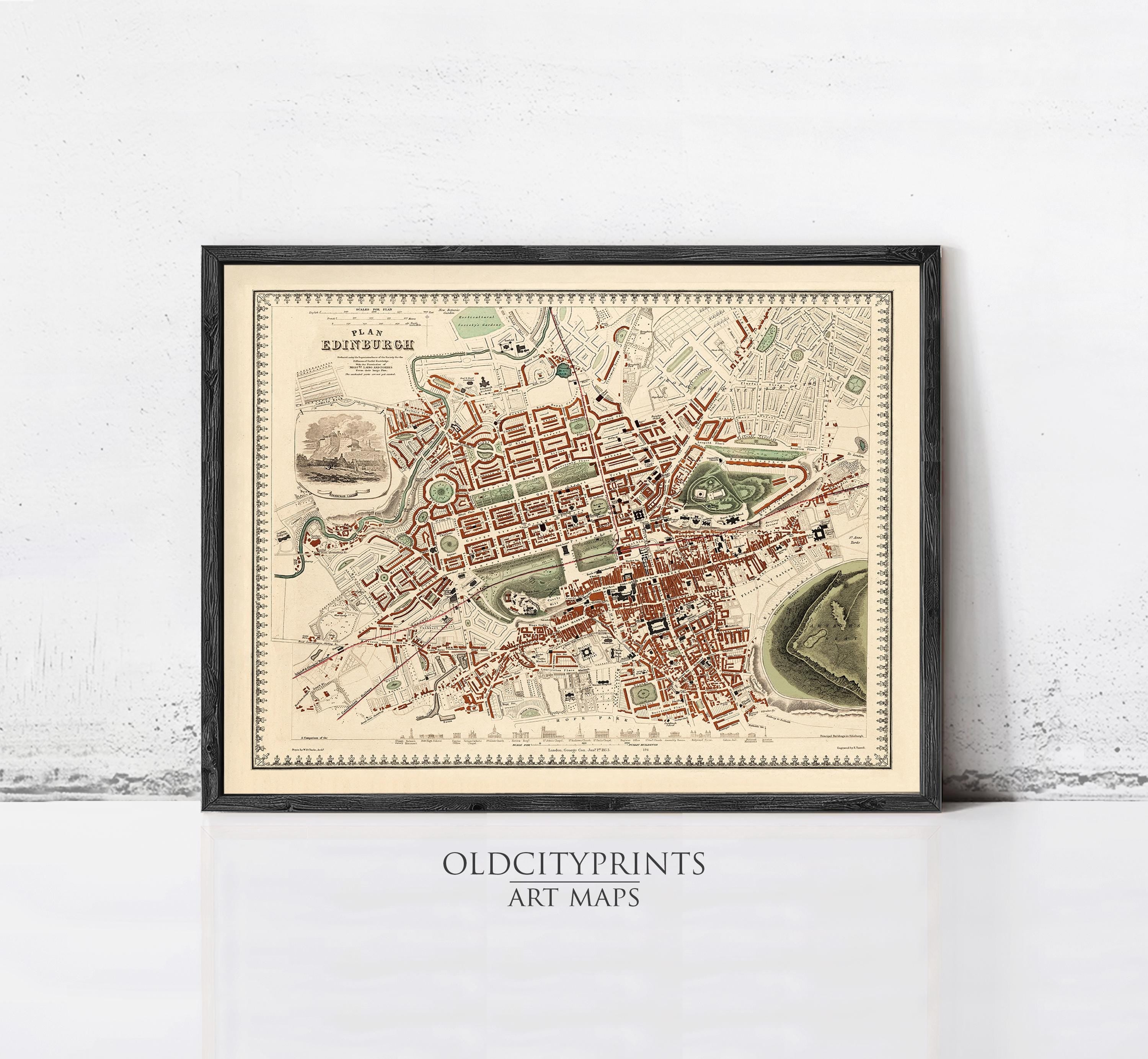 The image is a framed vintage map of a city, likely London, with detailed street and building plans.