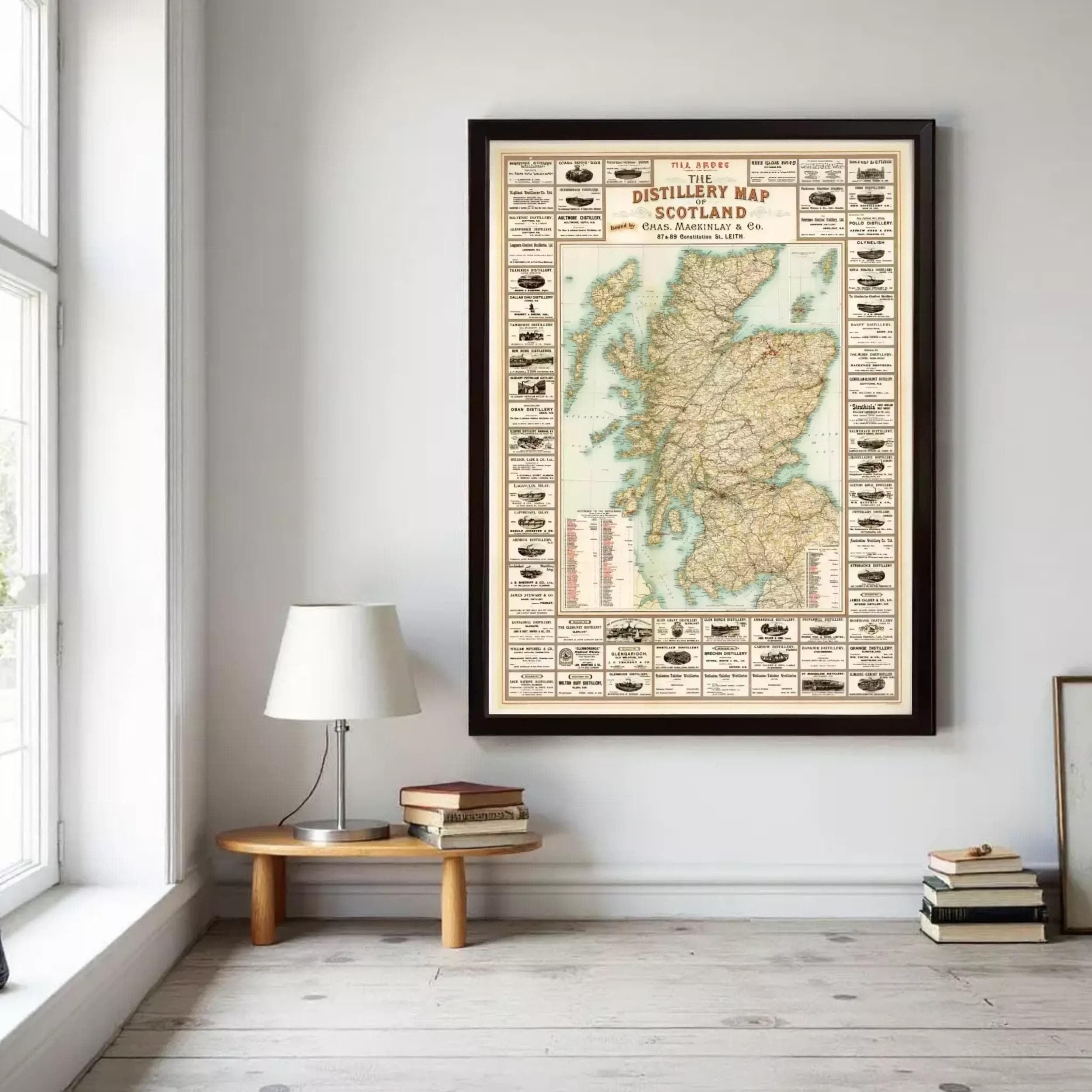 a large framed map of Scotland hanging on a wall, with various labels and icons indicating different locations and landmarks within the country.