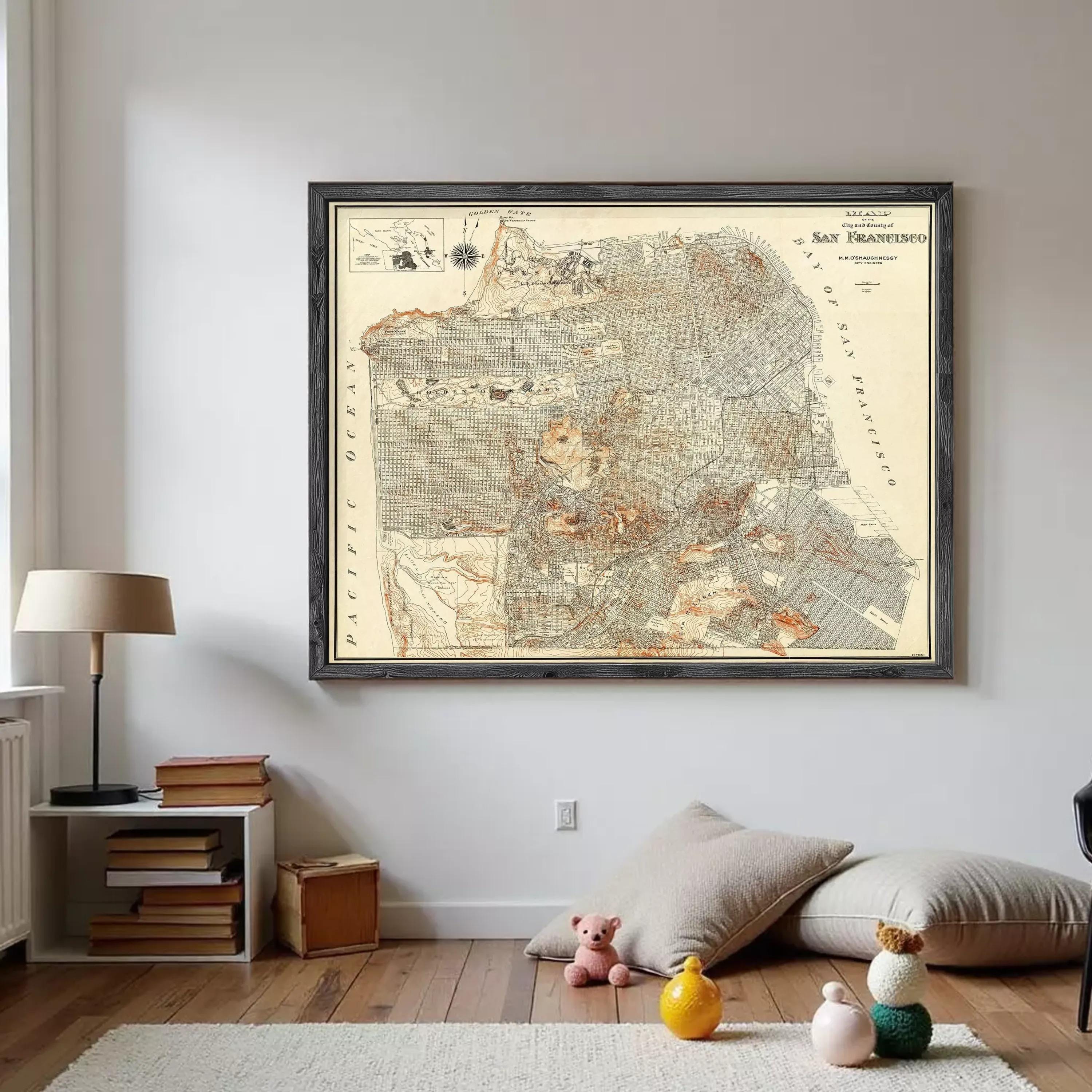 a large framed map of San Francisco hanging on a wall in a room.
