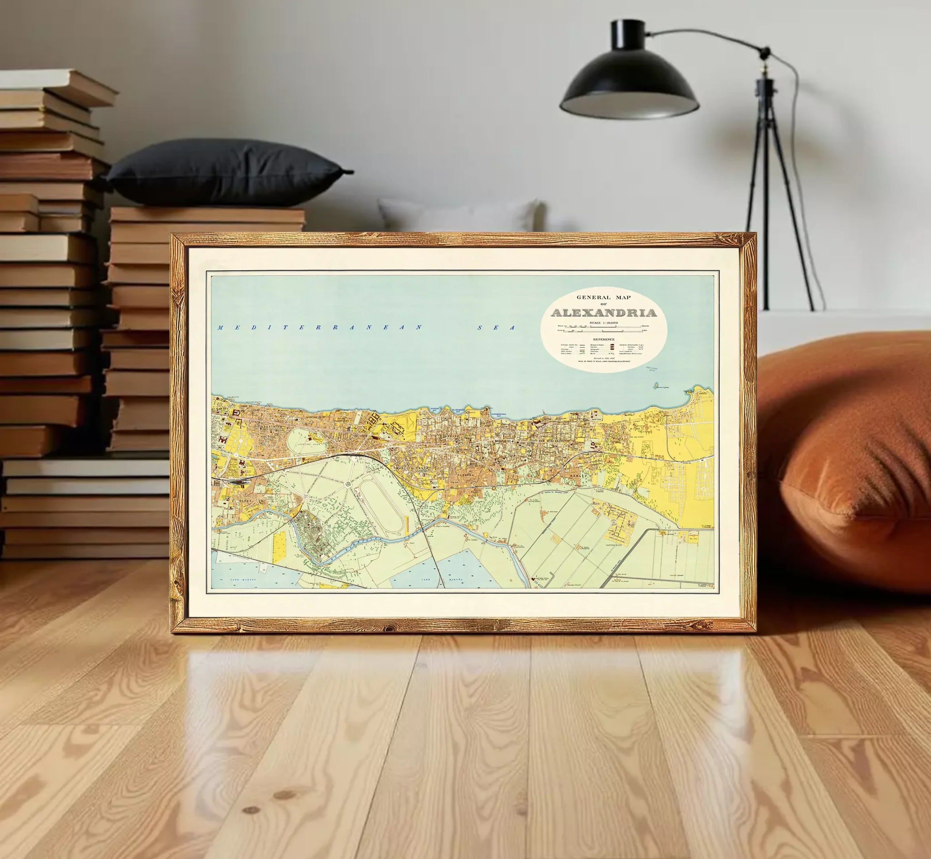 The image is a framed map of the city of Moscow, Russia, depicting the city's streets, landmarks, and surrounding areas.