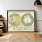 a framed vintage map of the polar regions, with two maps side by side.