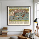 The image is a framed vintage map of a coastal city, depicting a bustling harbor filled with ships and boats.
