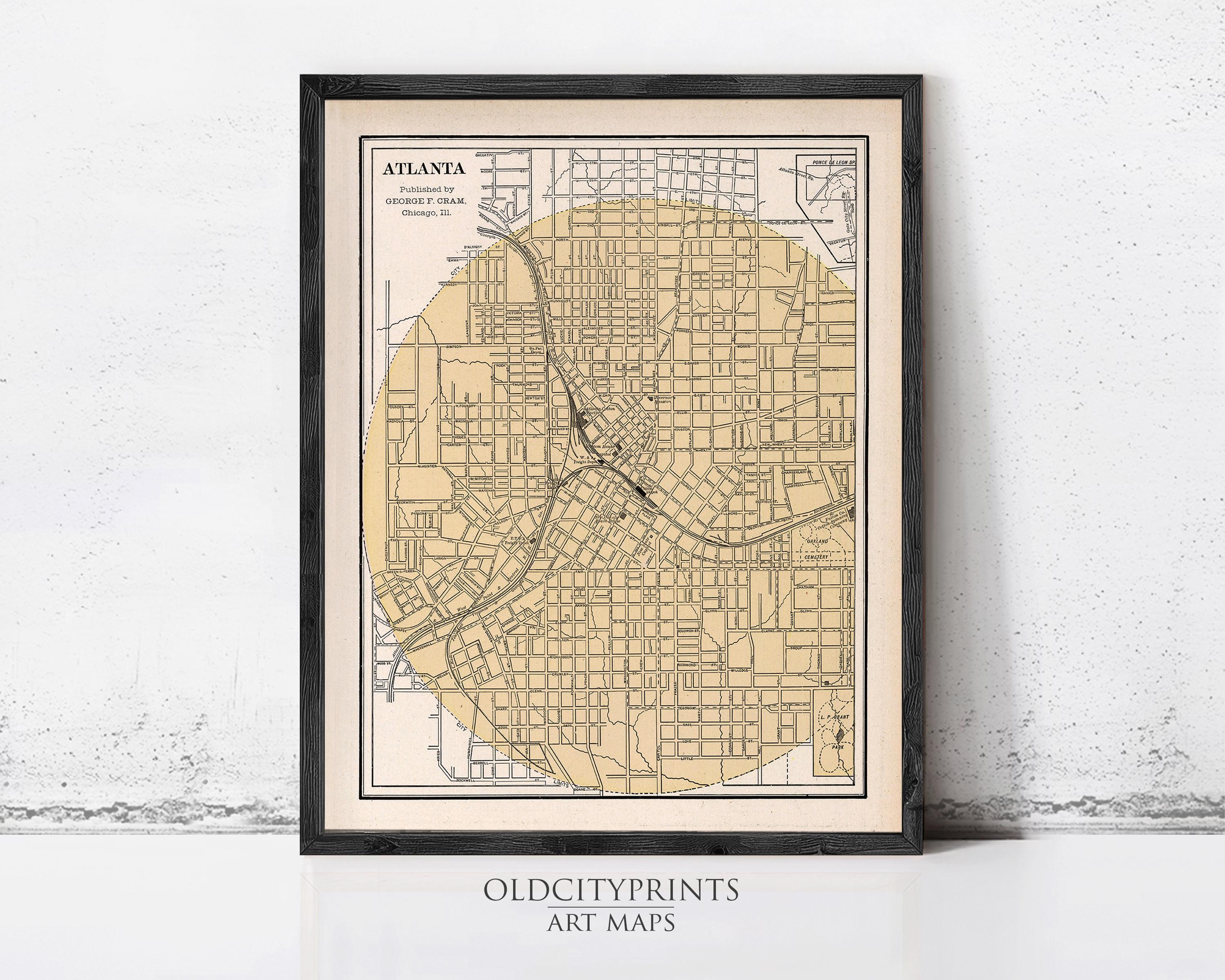 The image is a framed vintage map of Atlanta, Georgia, depicting the city's streets and neighborhoods.