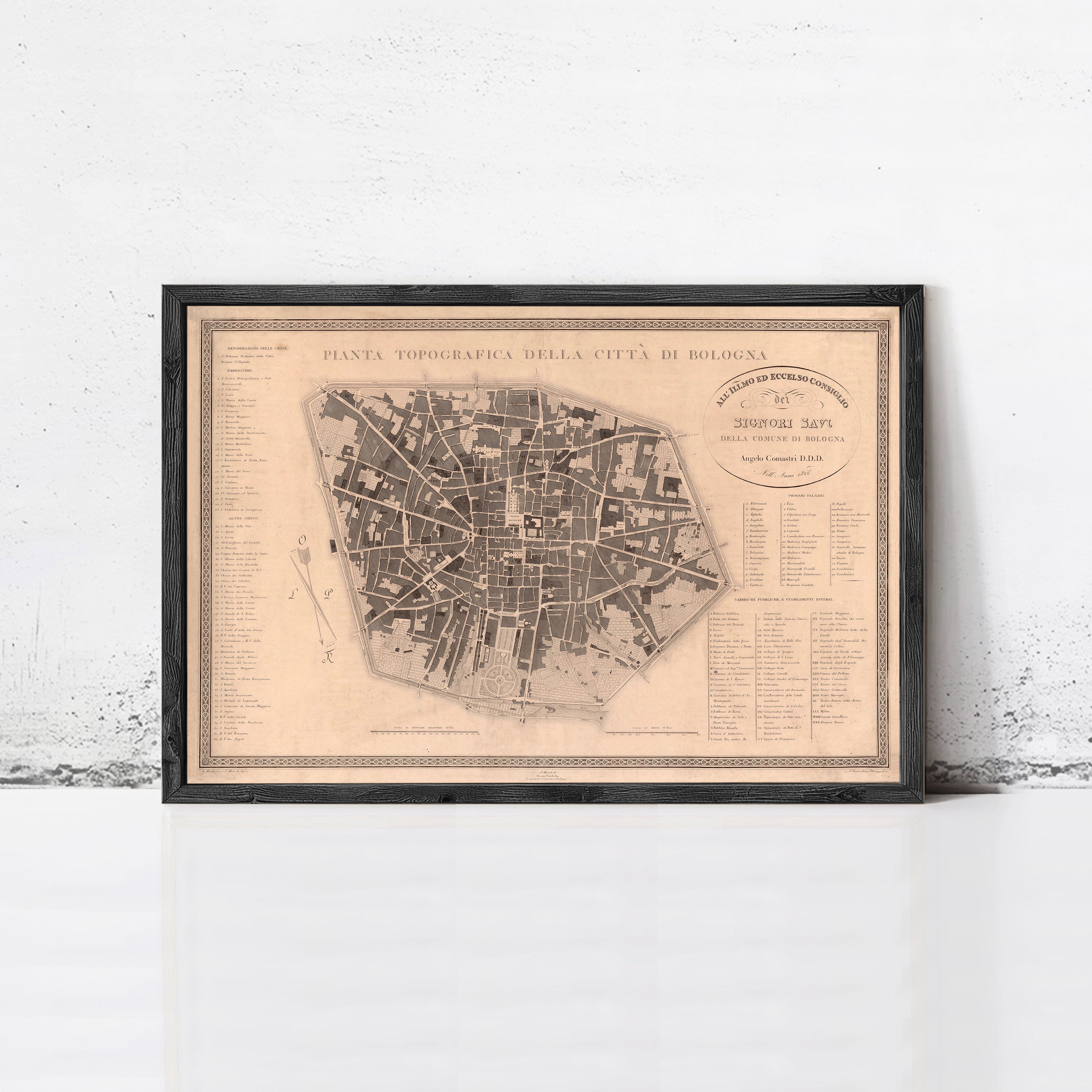 The image is a framed map of a city, likely in Italy, with detailed street names and labels.