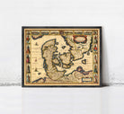 The image is a framed antique map of Europe, featuring detailed illustrations and labels.