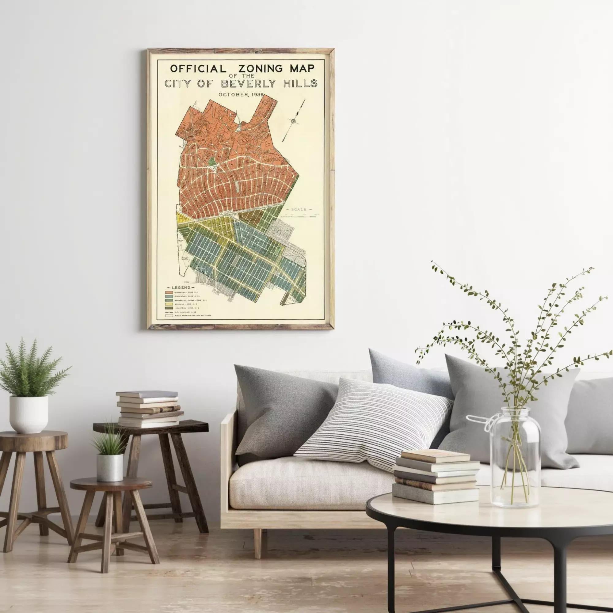 a framed vintage map of Beverly Hills, California, hanging on a wall in a living room setting.