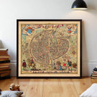 a large, colorful, and detailed map of a city, possibly a medieval or fantasy setting, displayed on a wall.
