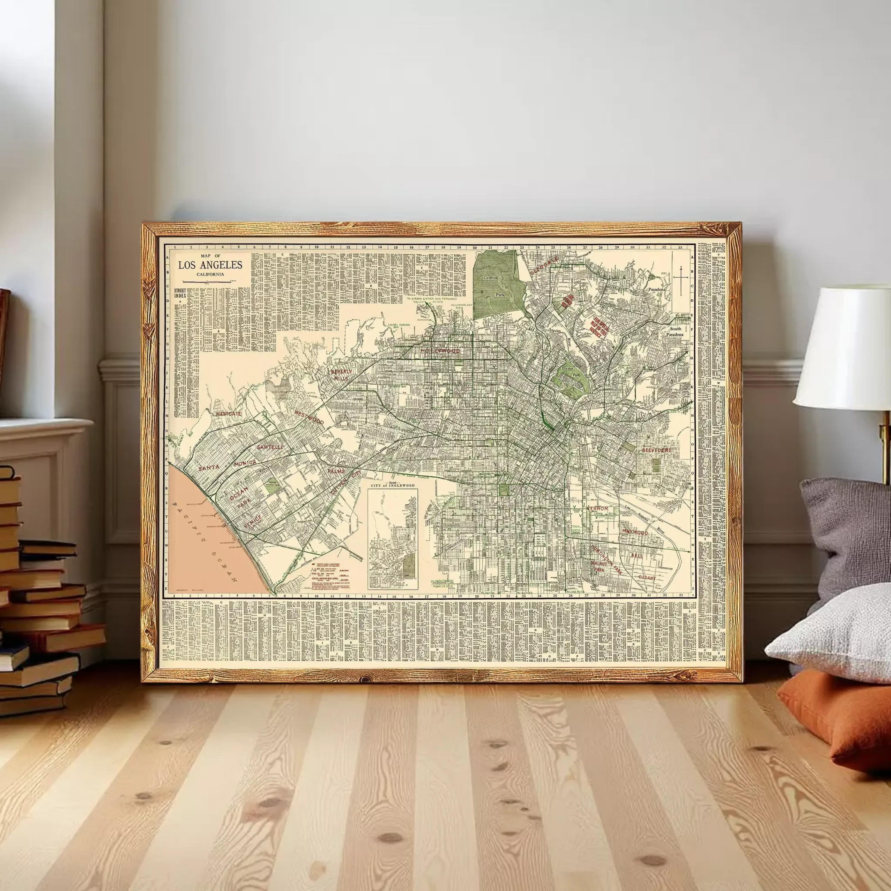 a large framed map of Los Angeles, California, with a wooden frame and a vintage appearance.