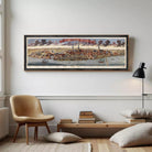 A framed painting depicting a cityscape with boats and ships in the water, set against a cloudy sky.
