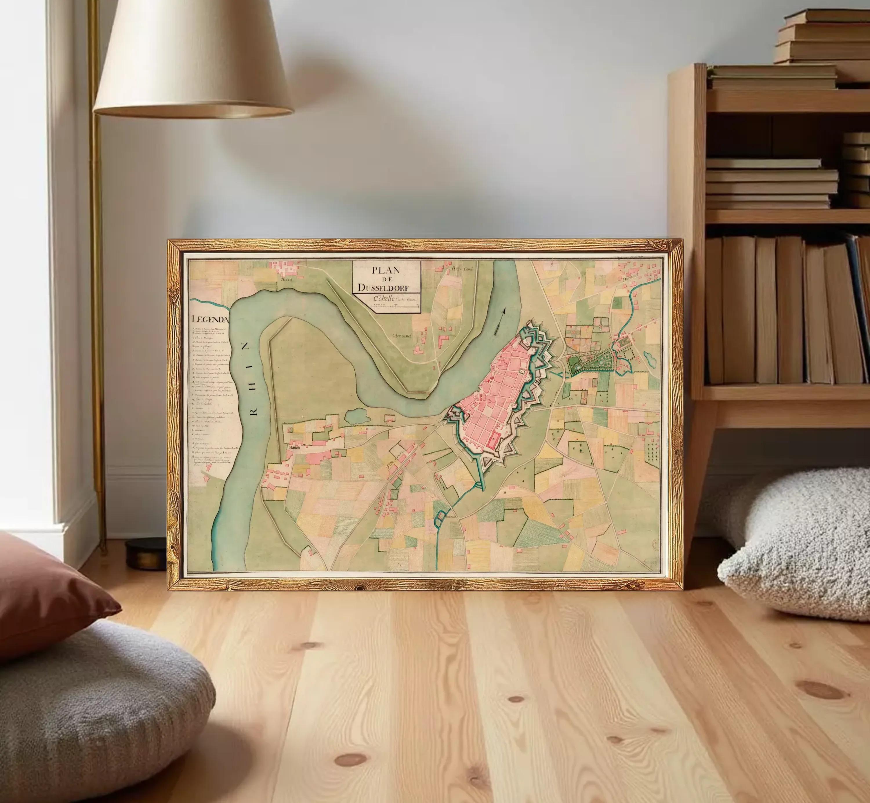 The image is a framed map of a city, depicting various landmarks and geographical features.
