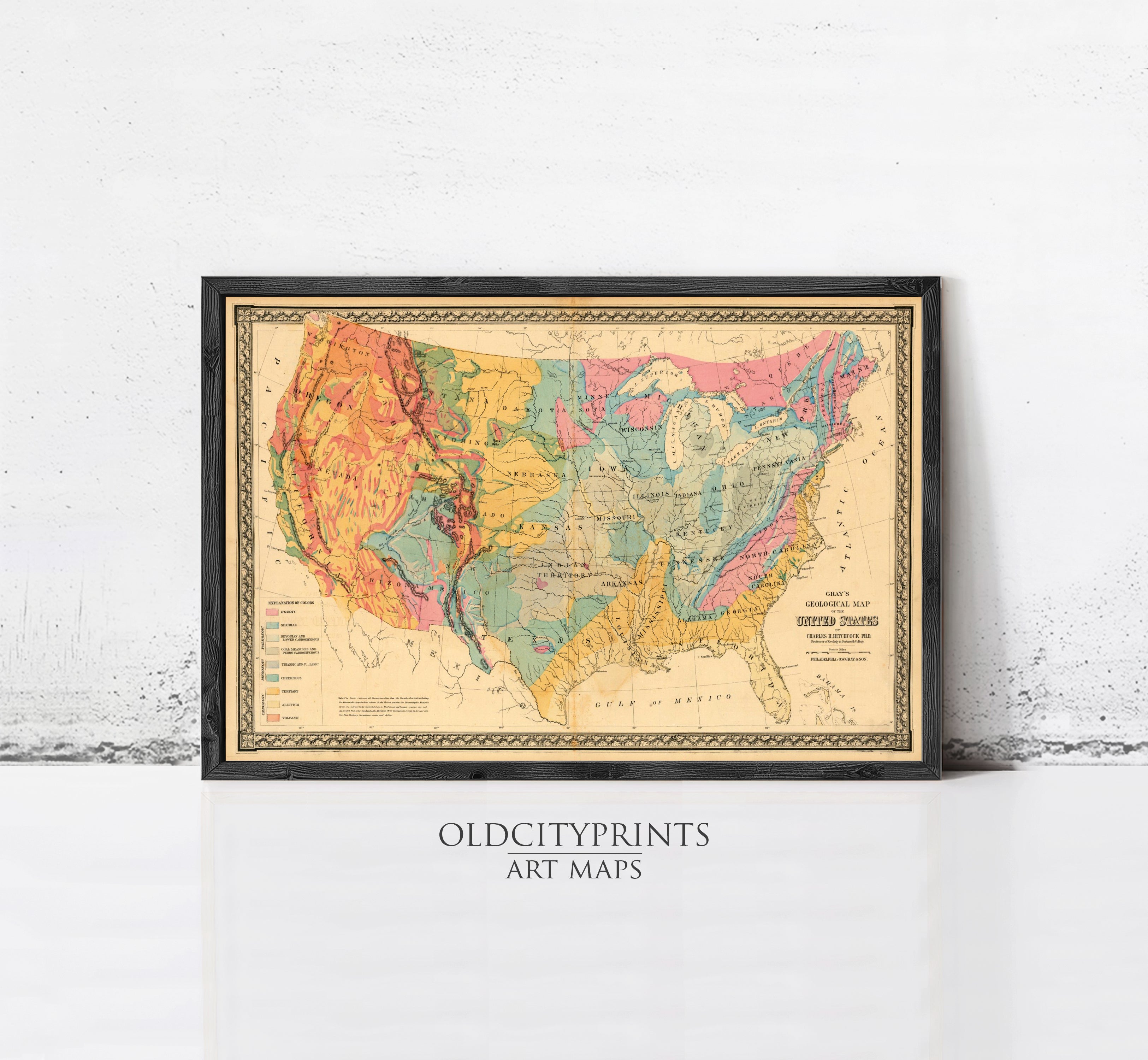 The image is a framed vintage geological map of the United States, depicting the different geological features of the country.