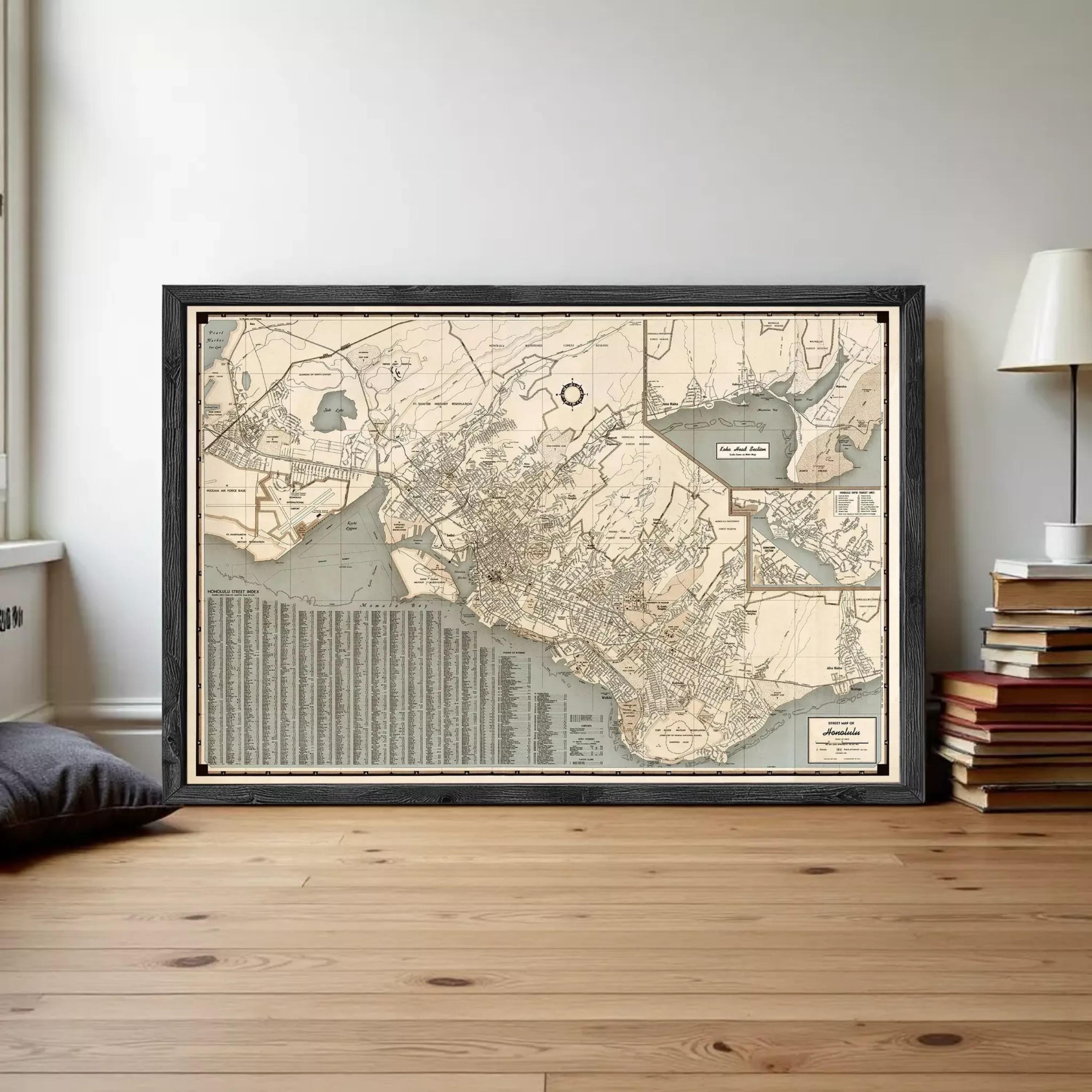 The image is a framed vintage map of a city, depicting various streets, landmarks, and bodies of water.