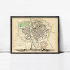 The image is a framed vintage map of a city, depicting a detailed layout of the streets, buildings, and other urban features.