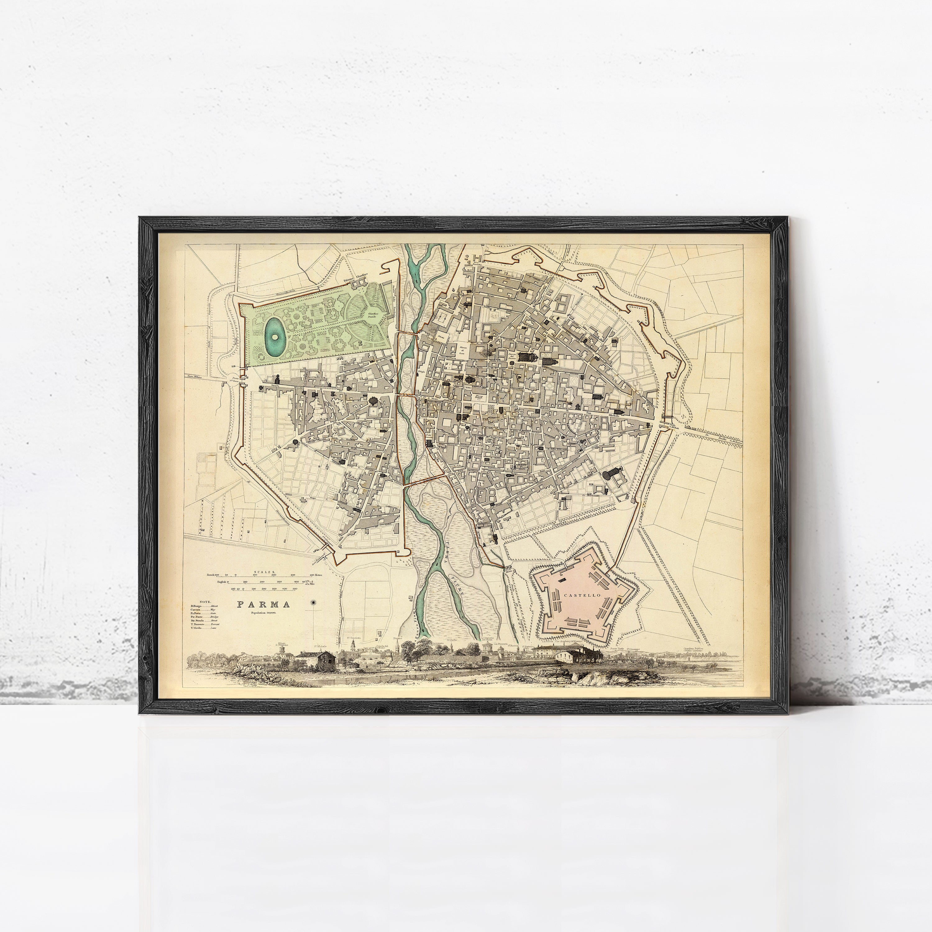 The image is a framed vintage map of a city, depicting a detailed layout of the streets, buildings, and other urban features.