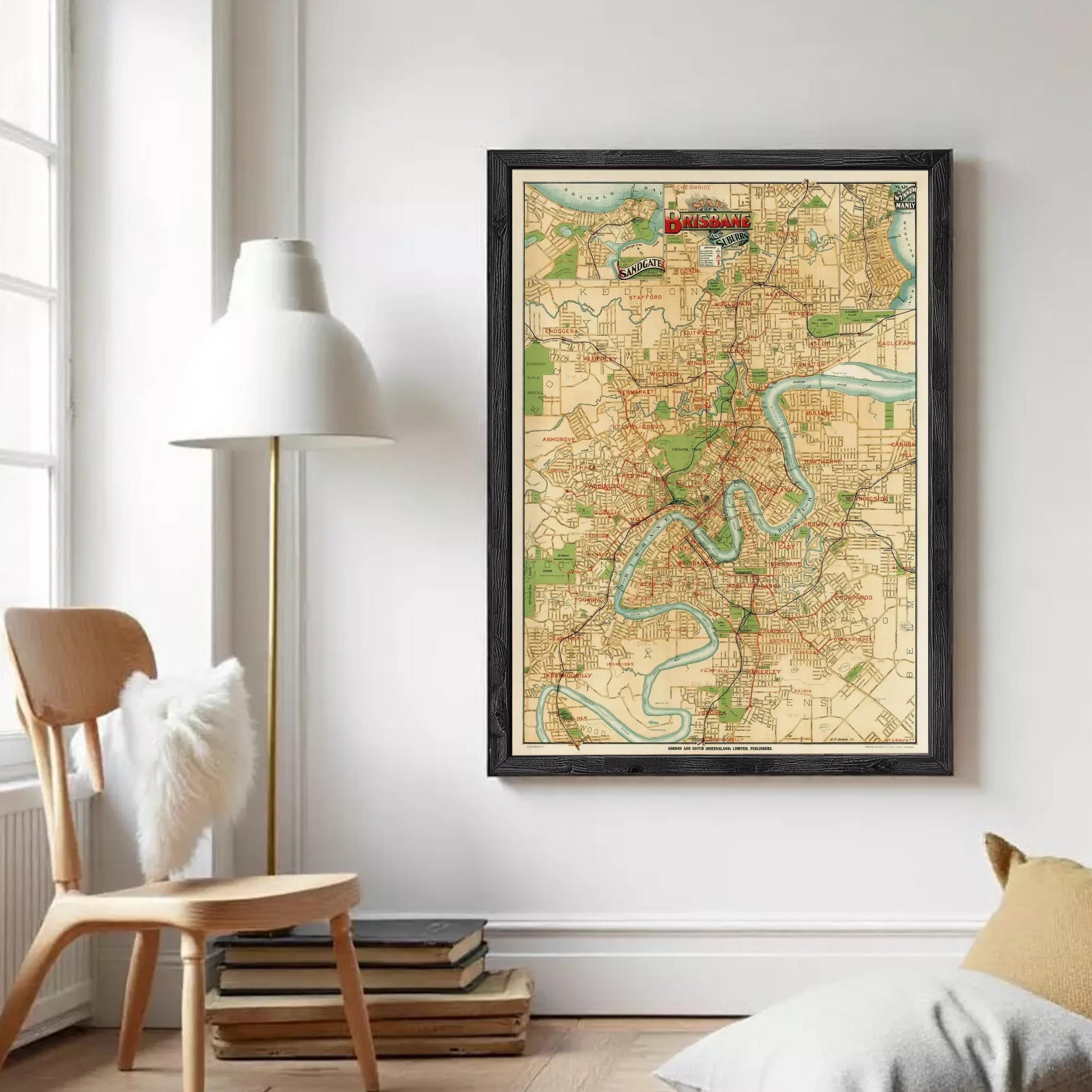 The image is a framed vintage map of a city, likely Birmingham, with various streets, landmarks, and rivers depicted.