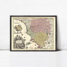 The image is a framed antique map of Europe, featuring detailed illustrations and color-coded regions.