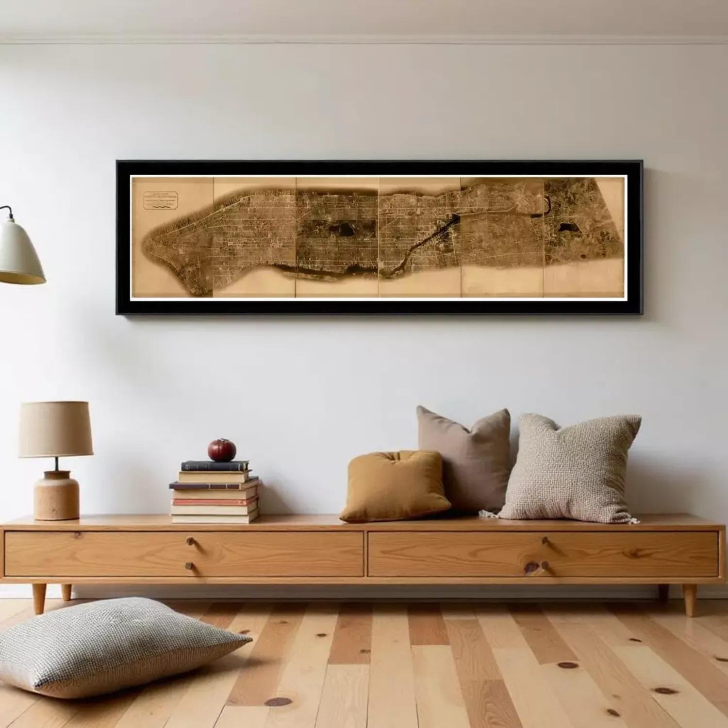 The image is a framed map of a large area, displayed on a wall.