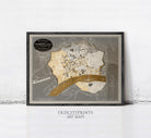 The image is a framed art print depicting a detailed map of a city, with various streets, landmarks, and other geographical features.