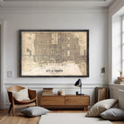 A framed map of Toronto, Canada, depicting the city's streets and landmarks.